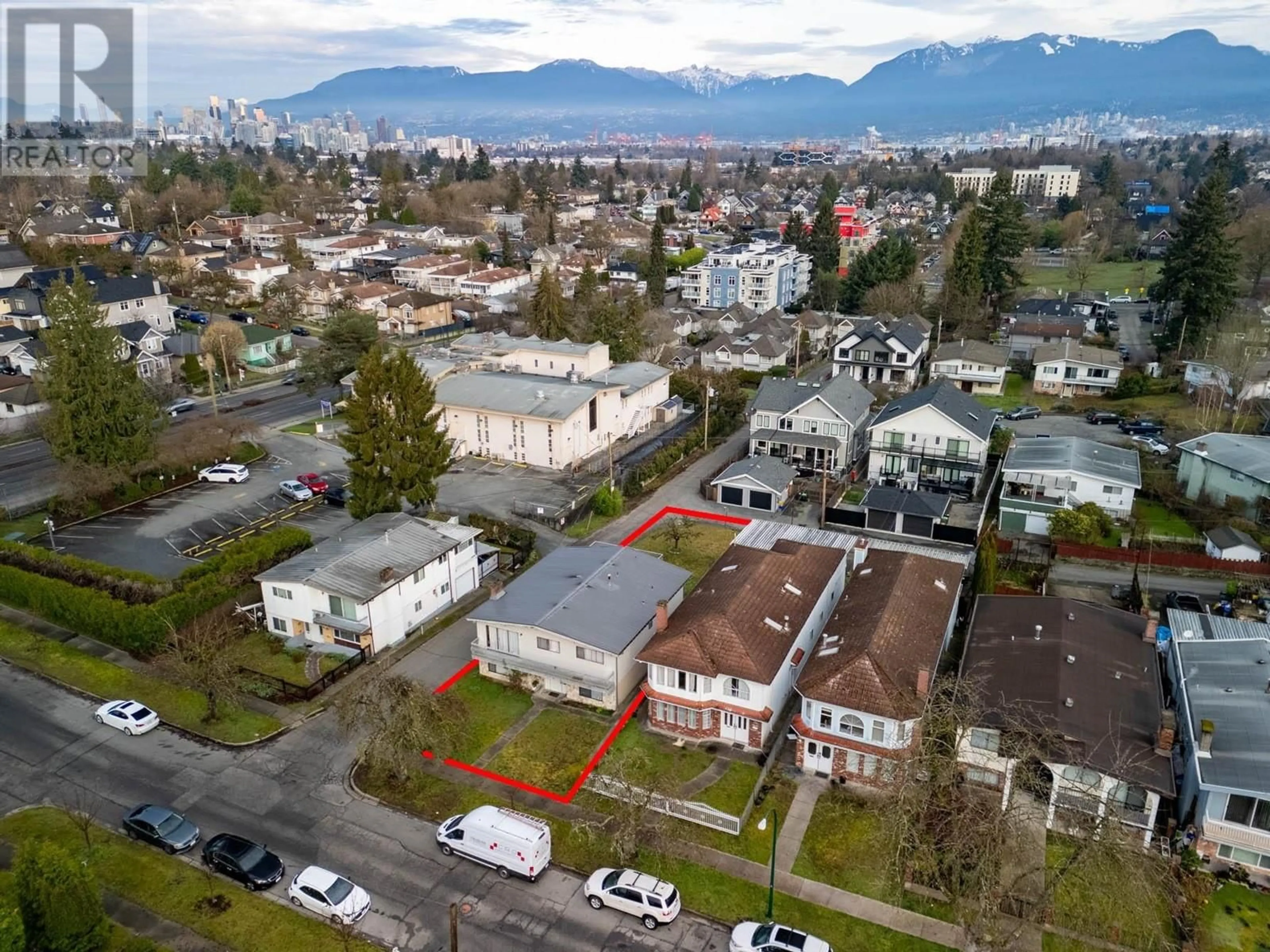 A pic from outside/outdoor area/front of a property/back of a property/a pic from drone, mountain view for 1425 E 18TH AVENUE, Vancouver British Columbia V5N2H2