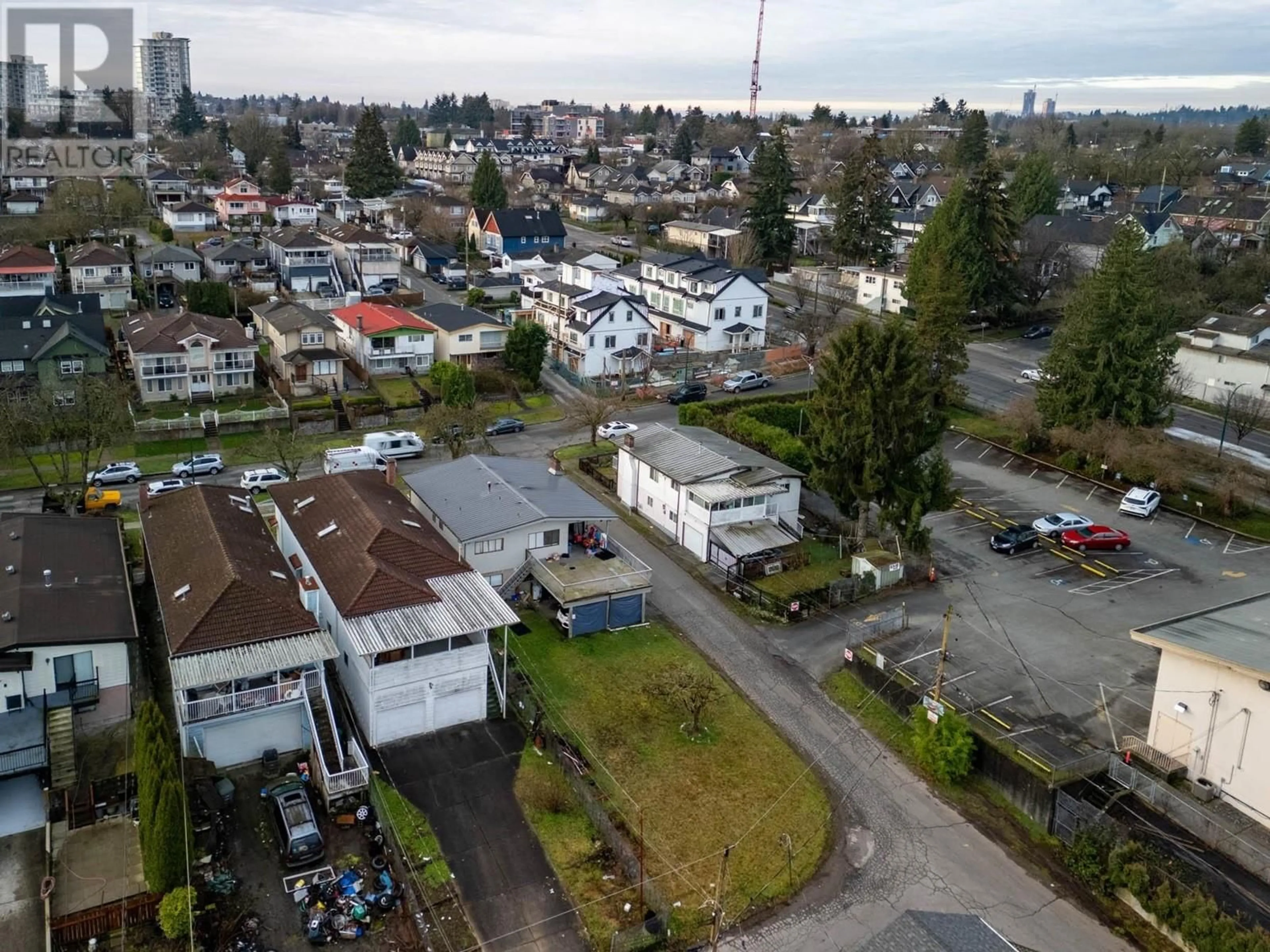 A pic from outside/outdoor area/front of a property/back of a property/a pic from drone, street for 1425 E 18TH AVENUE, Vancouver British Columbia V5N2H2