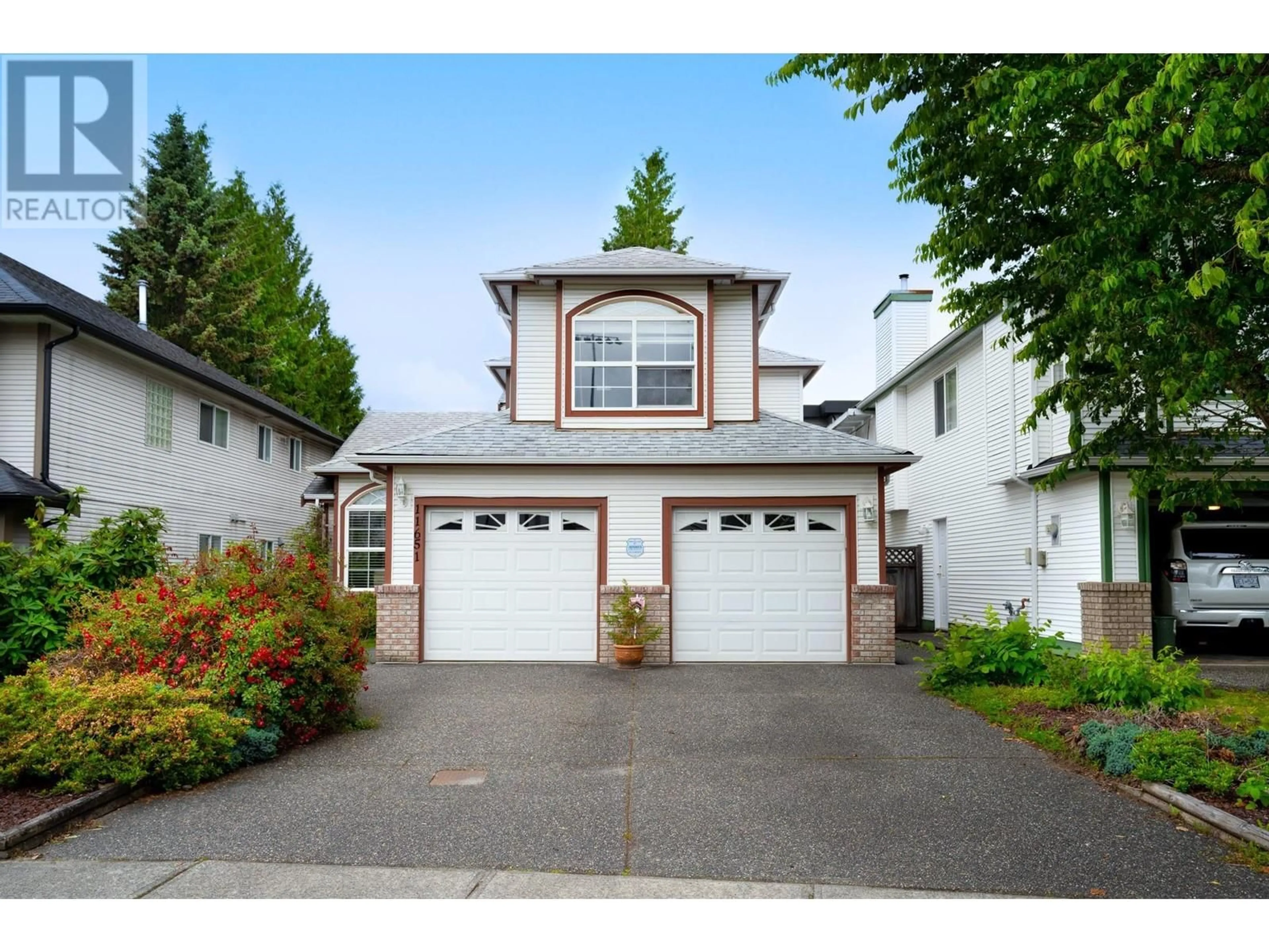 Home with vinyl exterior material, street for 11651 230B STREET, Maple Ridge British Columbia V2X1Z4