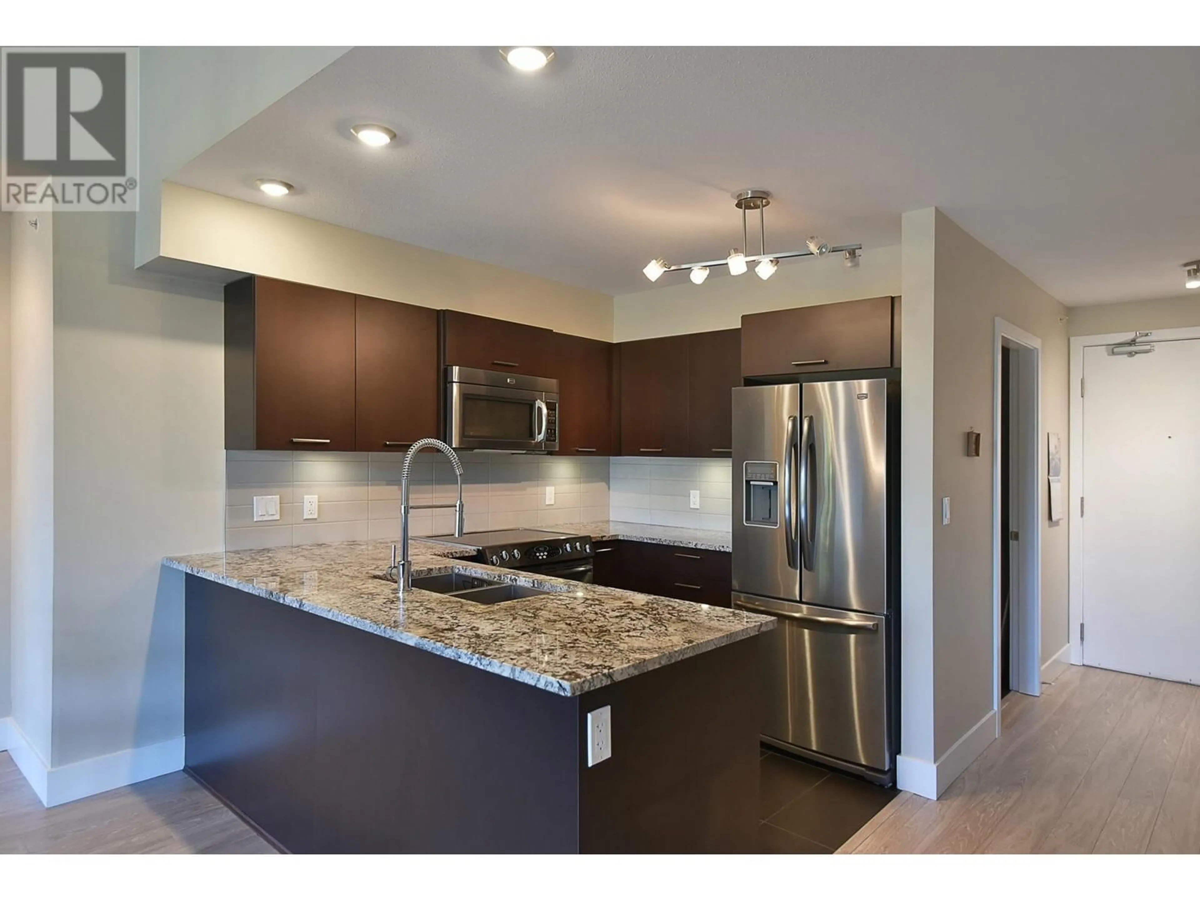 Open concept kitchen, unknown for 309 5682 WHARF AVENUE, Sechelt British Columbia V7Z0J3