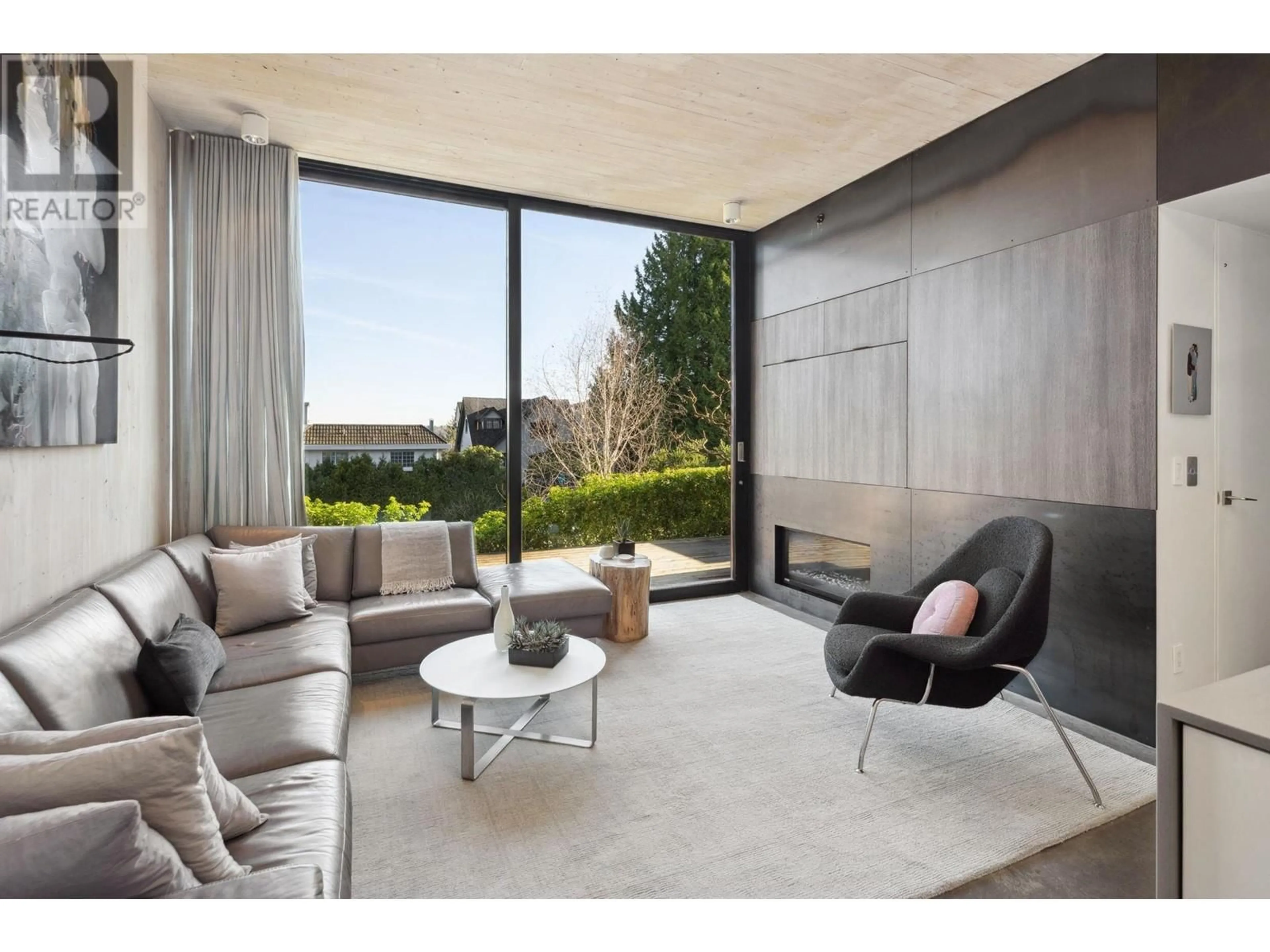 Living room with furniture, cement floor for 3515 BLENHEIM STREET, Vancouver British Columbia V6L2X8