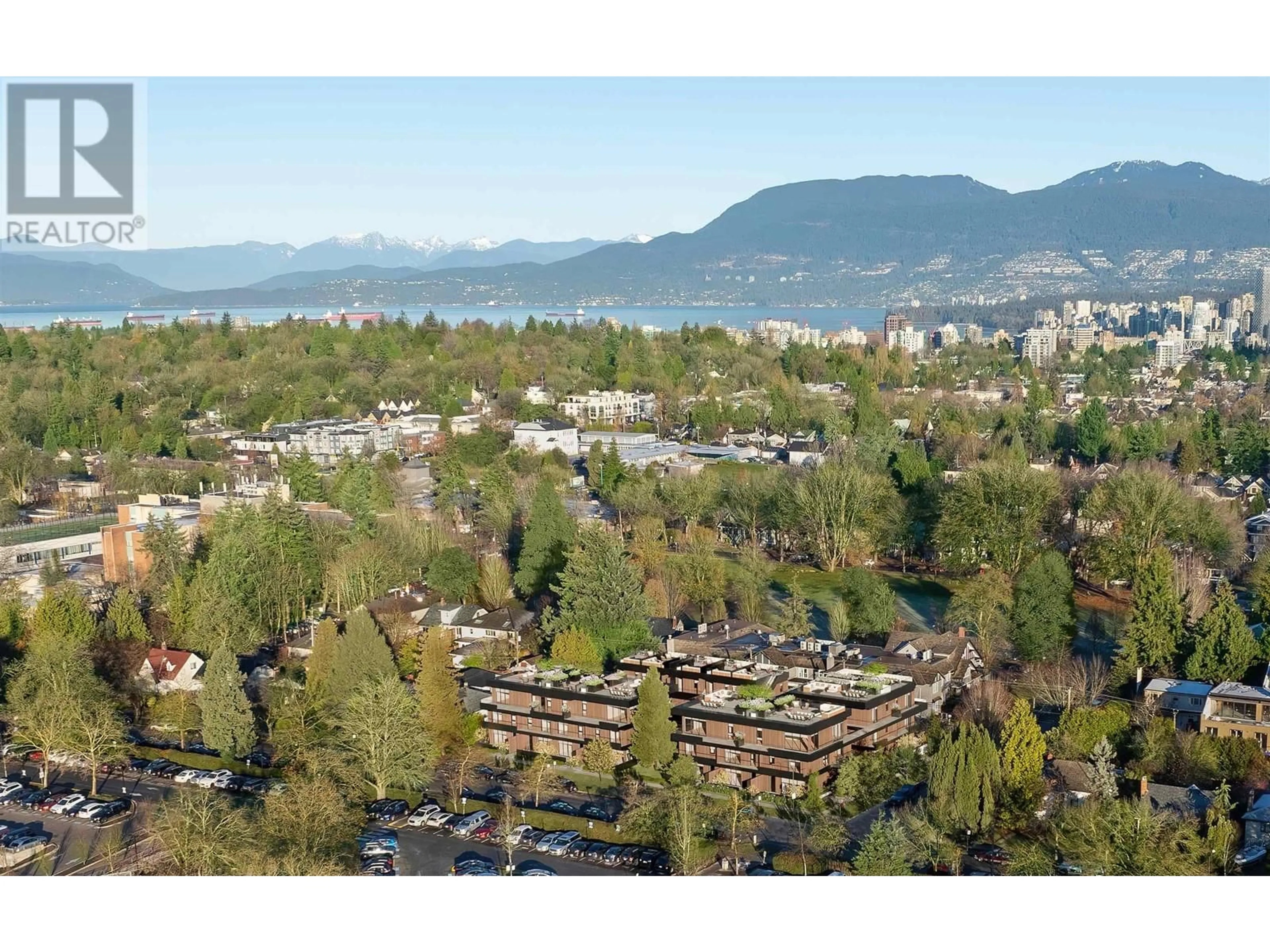 A pic from outside/outdoor area/front of a property/back of a property/a pic from drone, mountain view for 109 4383 WILLOW STREET, Vancouver British Columbia V5Z2G6