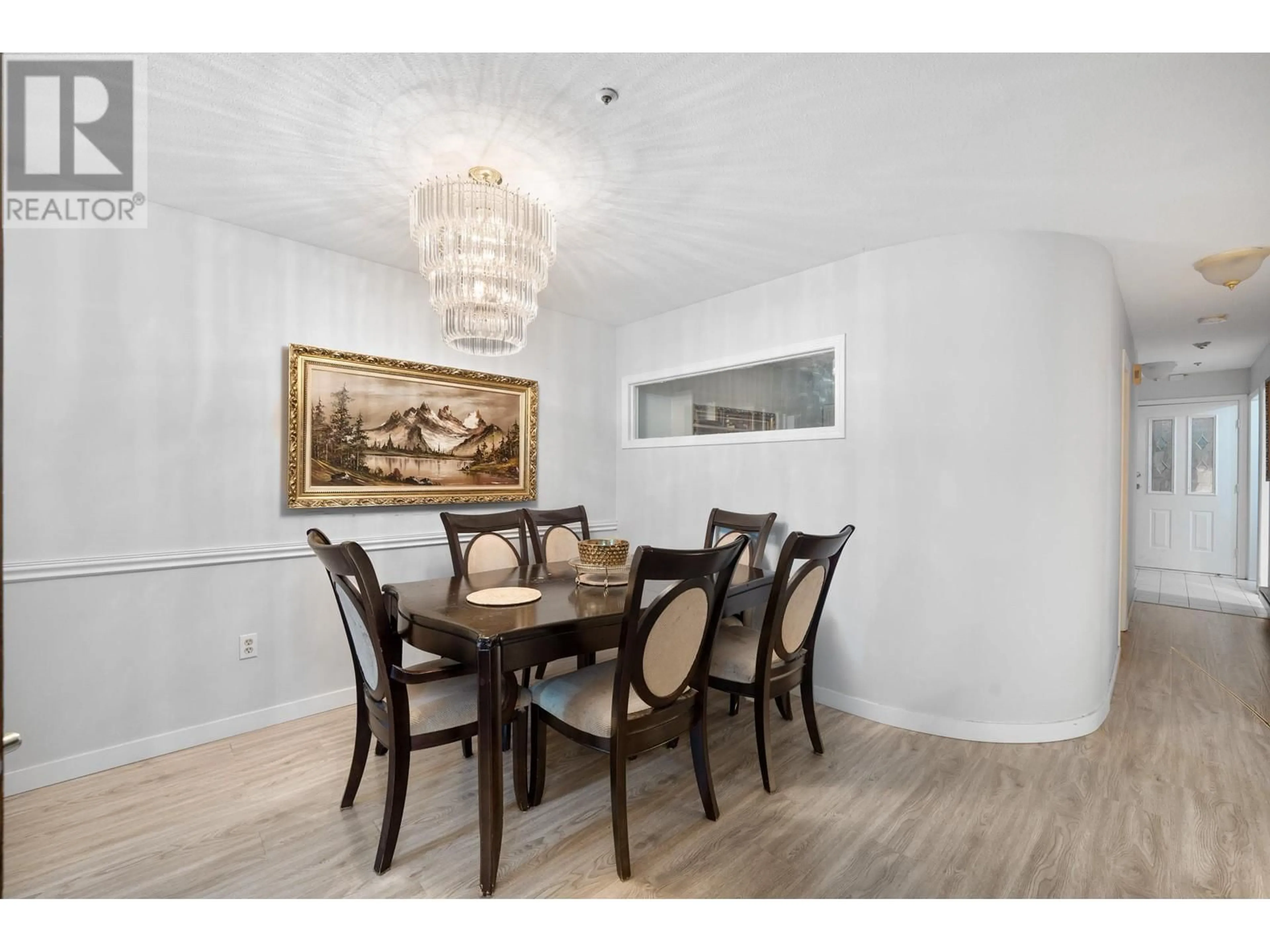 Dining room, wood/laminate floor for 105 2250 SE MARINE DRIVE, Vancouver British Columbia V5P2S2