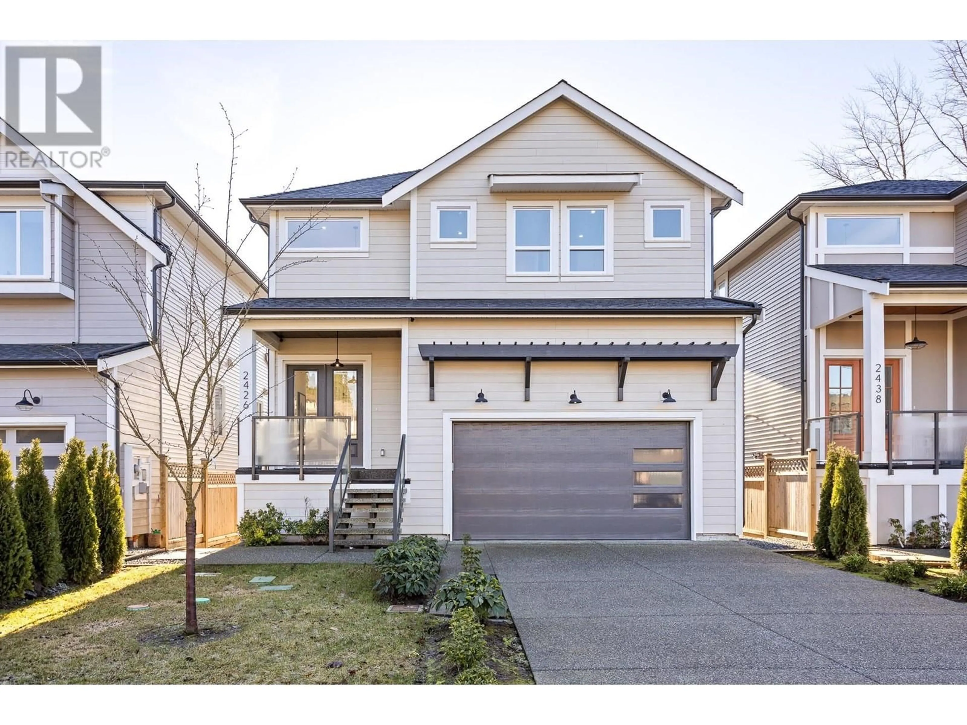 Home with vinyl exterior material, street for 2426 FRISKIE AVENUE, Port Coquitlam British Columbia V3B7P9