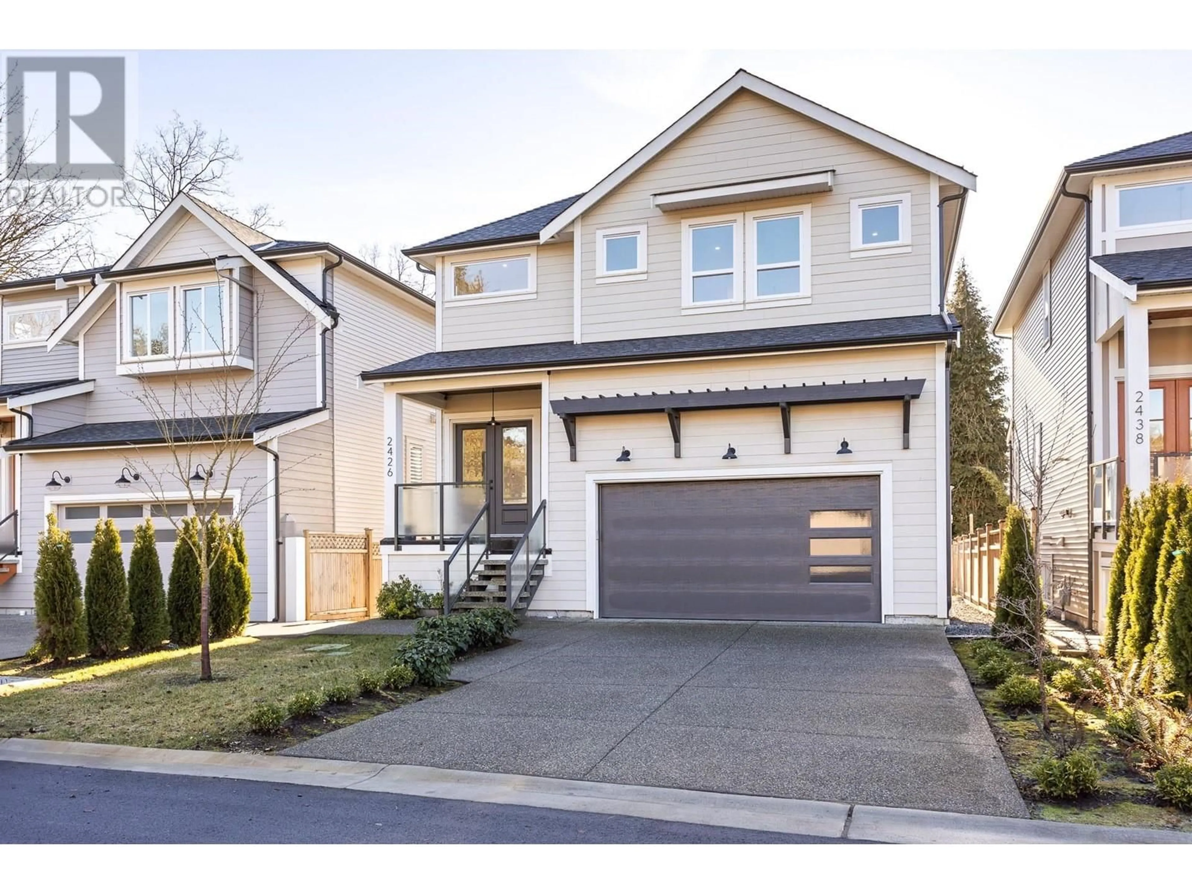 Home with vinyl exterior material, street for 2426 FRISKIE AVENUE, Port Coquitlam British Columbia V3B7P9