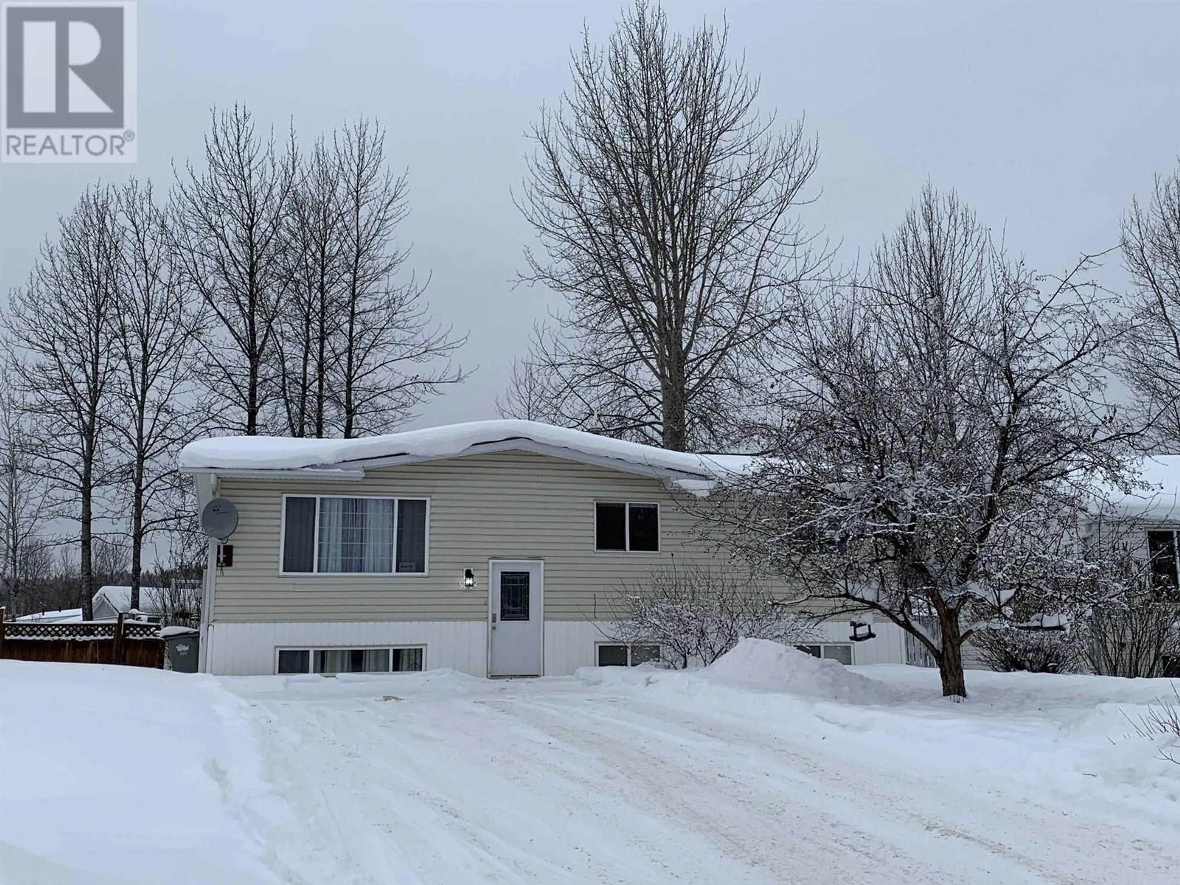 Home with vinyl exterior material, street for 5323 WILLOW ROAD, Fort Nelson British Columbia V0C1R0