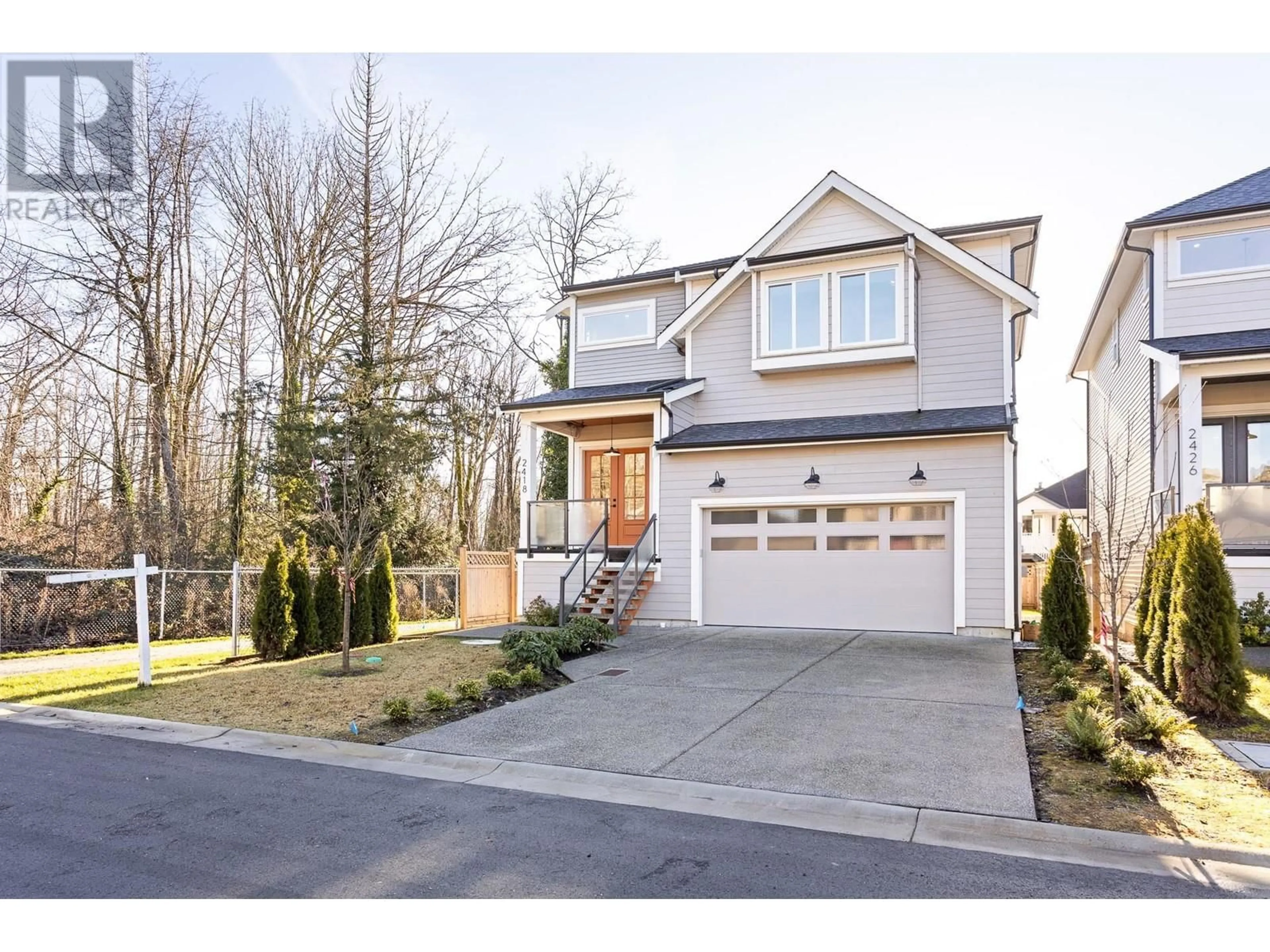 Home with vinyl exterior material, street for 2418 FRISKIE AVENUE, Port Coquitlam British Columbia V3B7P9