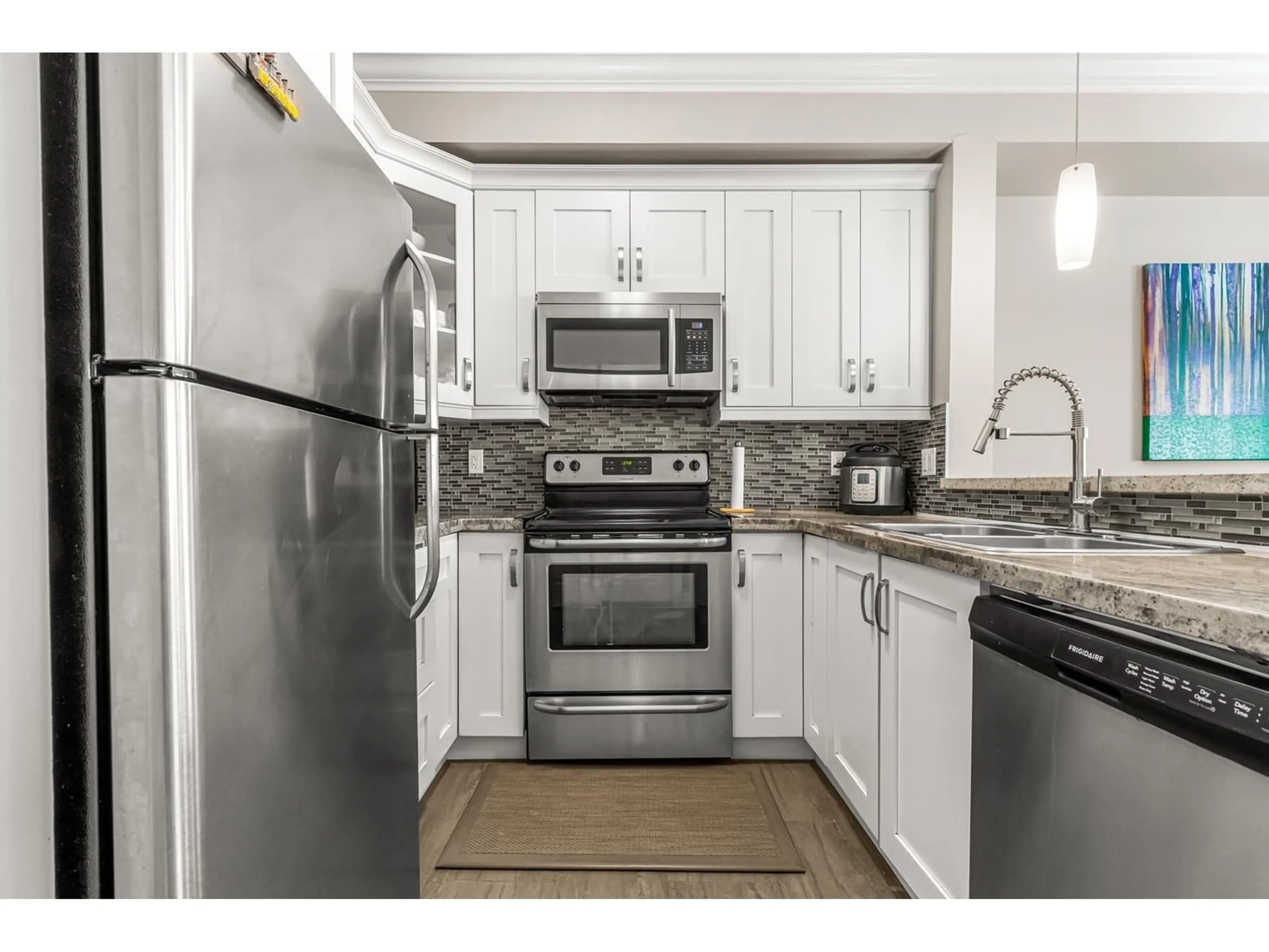 Standard kitchen, ceramic/tile floor for 205 13897 FRASER HIGHWAY, Surrey British Columbia V3T0G8