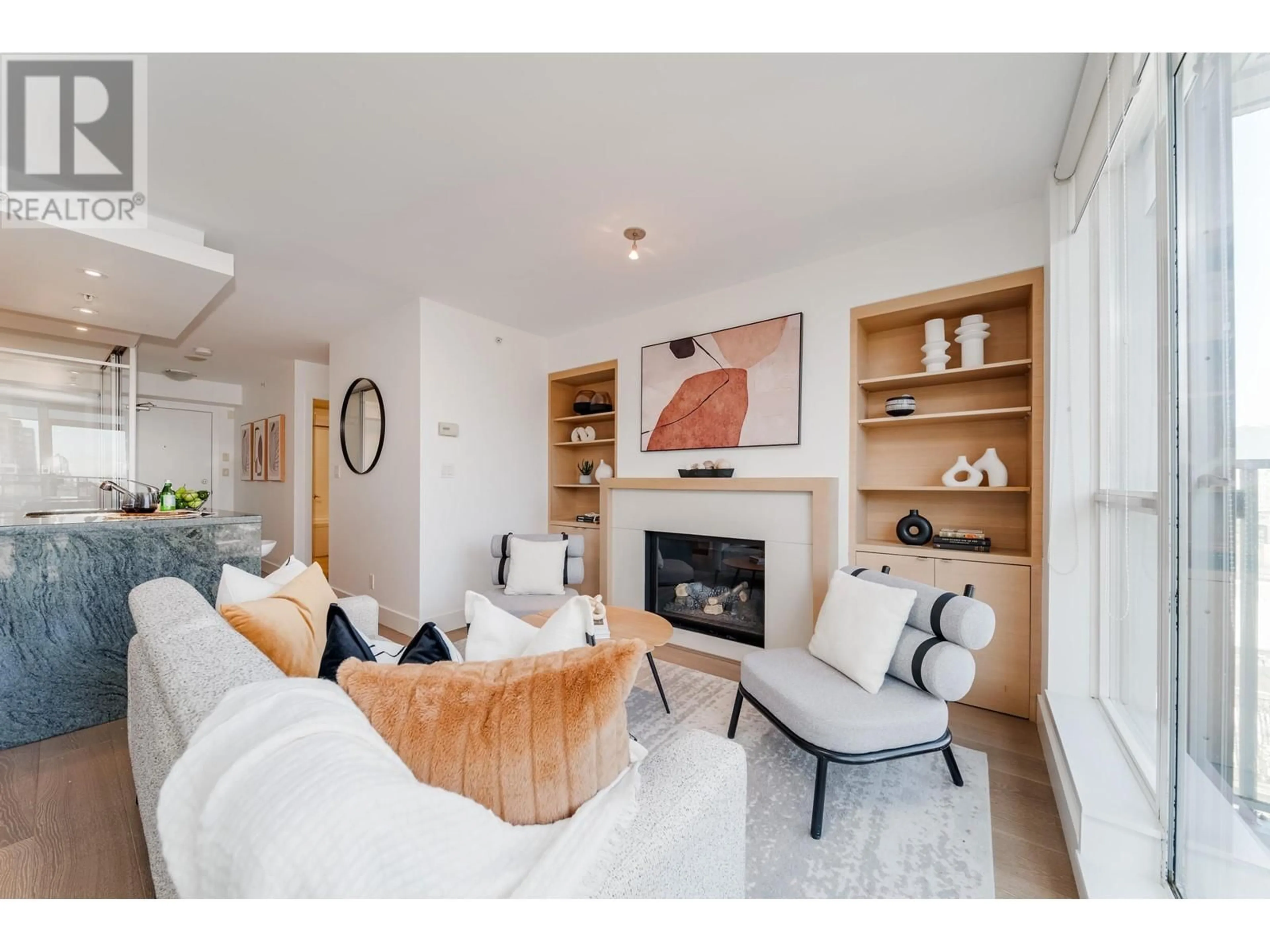 Living room with furniture, wood/laminate floor for 702 1530 W 8TH AVENUE, Vancouver British Columbia V6J5M6