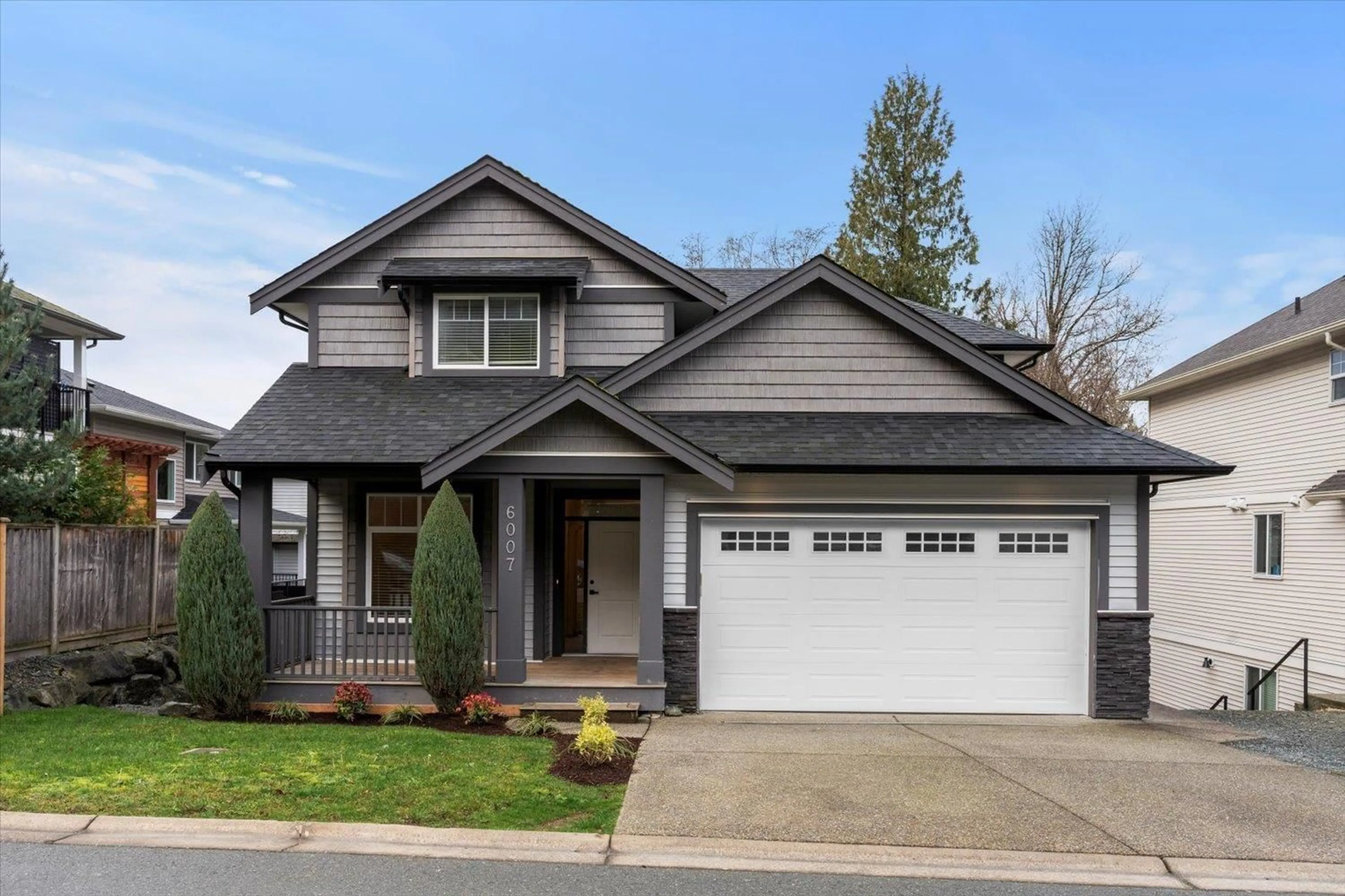 Home with vinyl exterior material, street for 6007 REXFORD DRIVE|Promontory, Chilliwack British Columbia V2R0L3