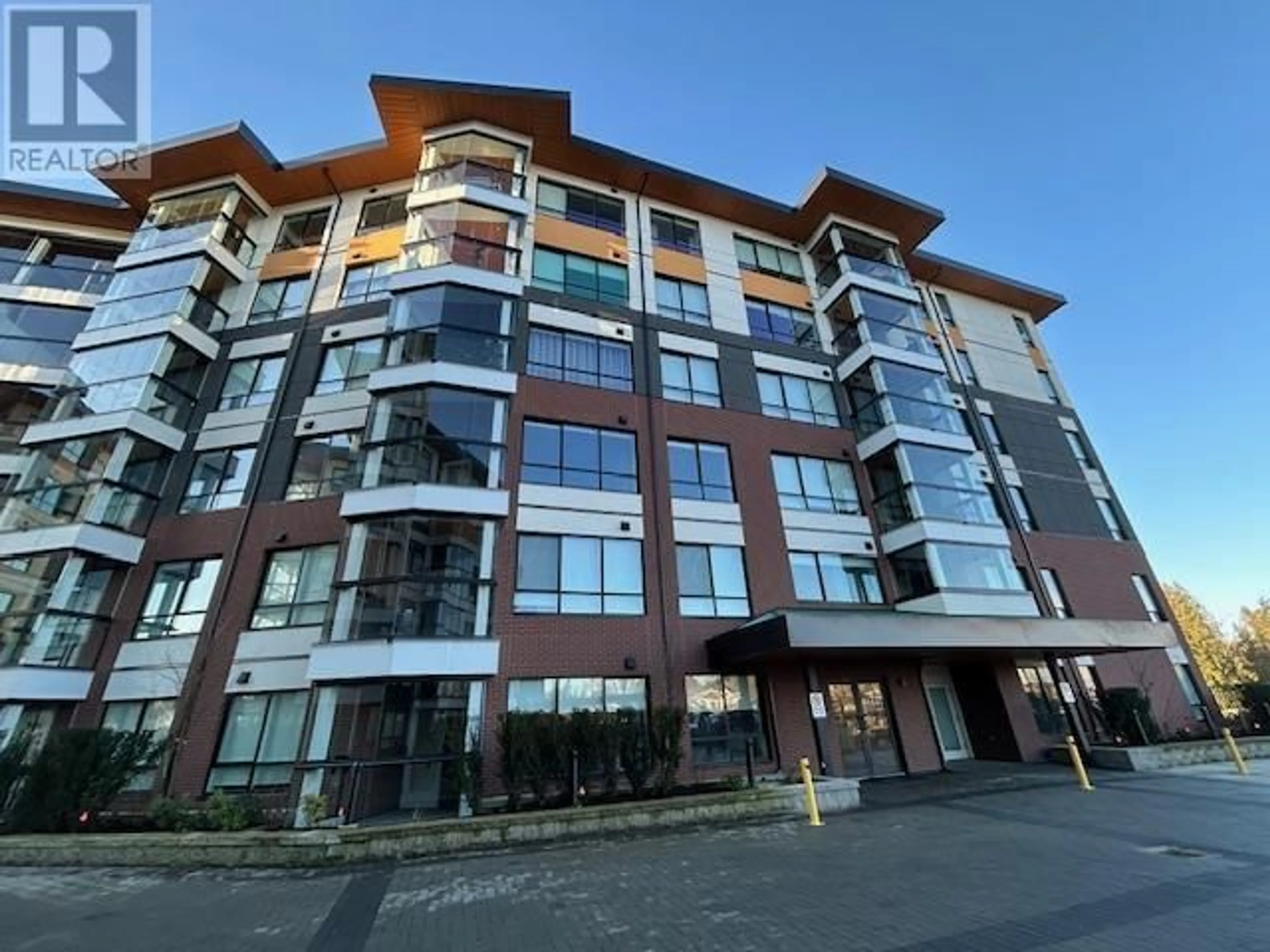 A pic from outside/outdoor area/front of a property/back of a property/a pic from drone, building for 117 11641 227 STREET, Maple Ridge British Columbia V2X9J6