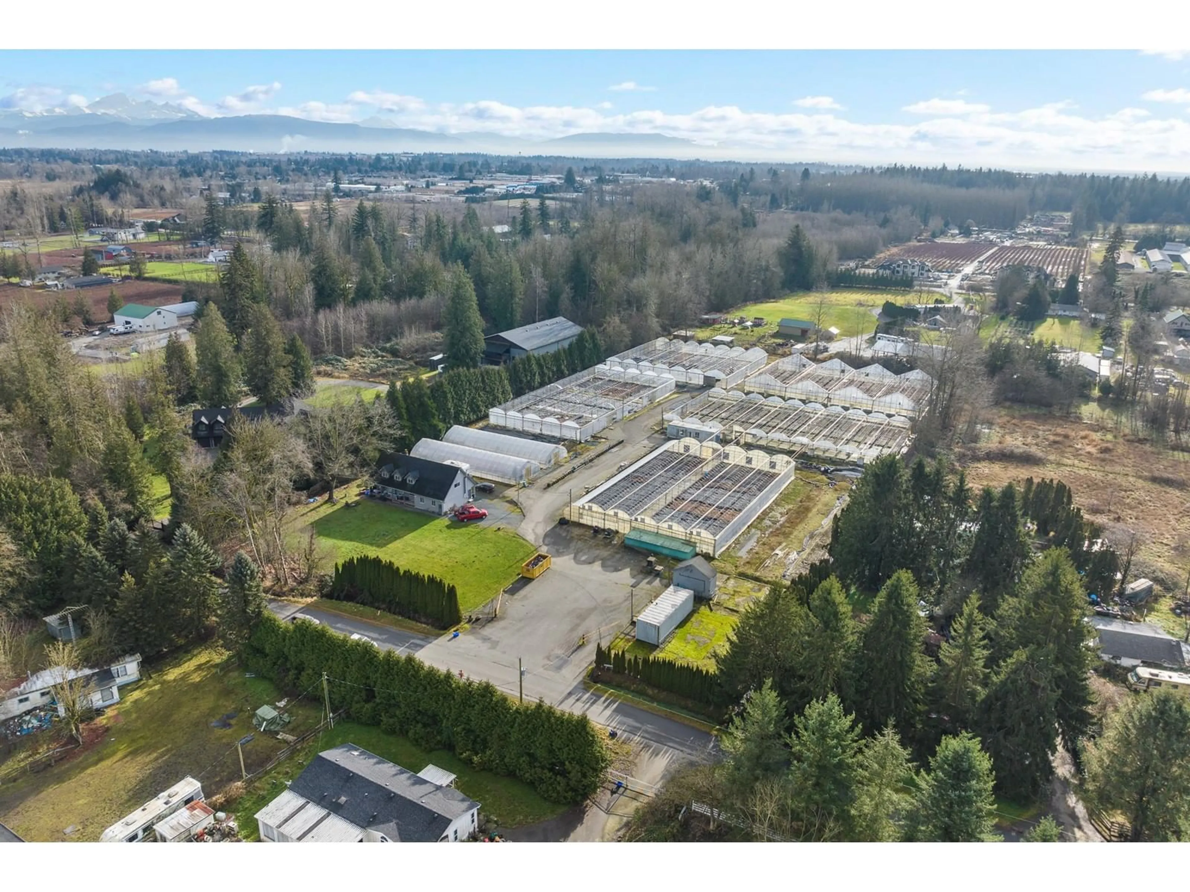 A pic from outside/outdoor area/front of a property/back of a property/a pic from drone, mountain view for 25794 38 AVENUE, Langley British Columbia V4W2R4