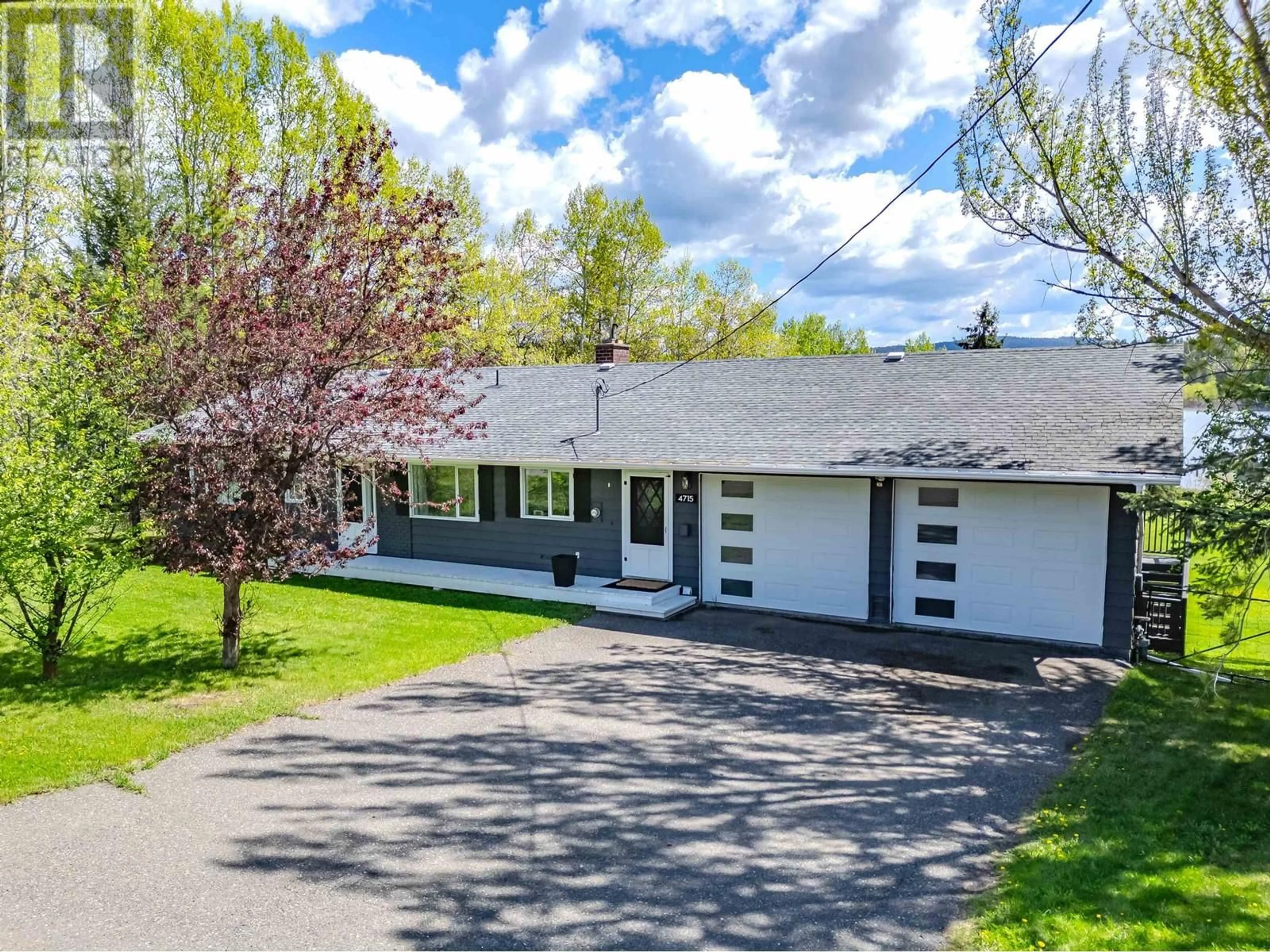 A pic from outside/outdoor area/front of a property/back of a property/a pic from drone, street for 4715 PARKER COURT, 108 Mile Ranch British Columbia V0K2Z0