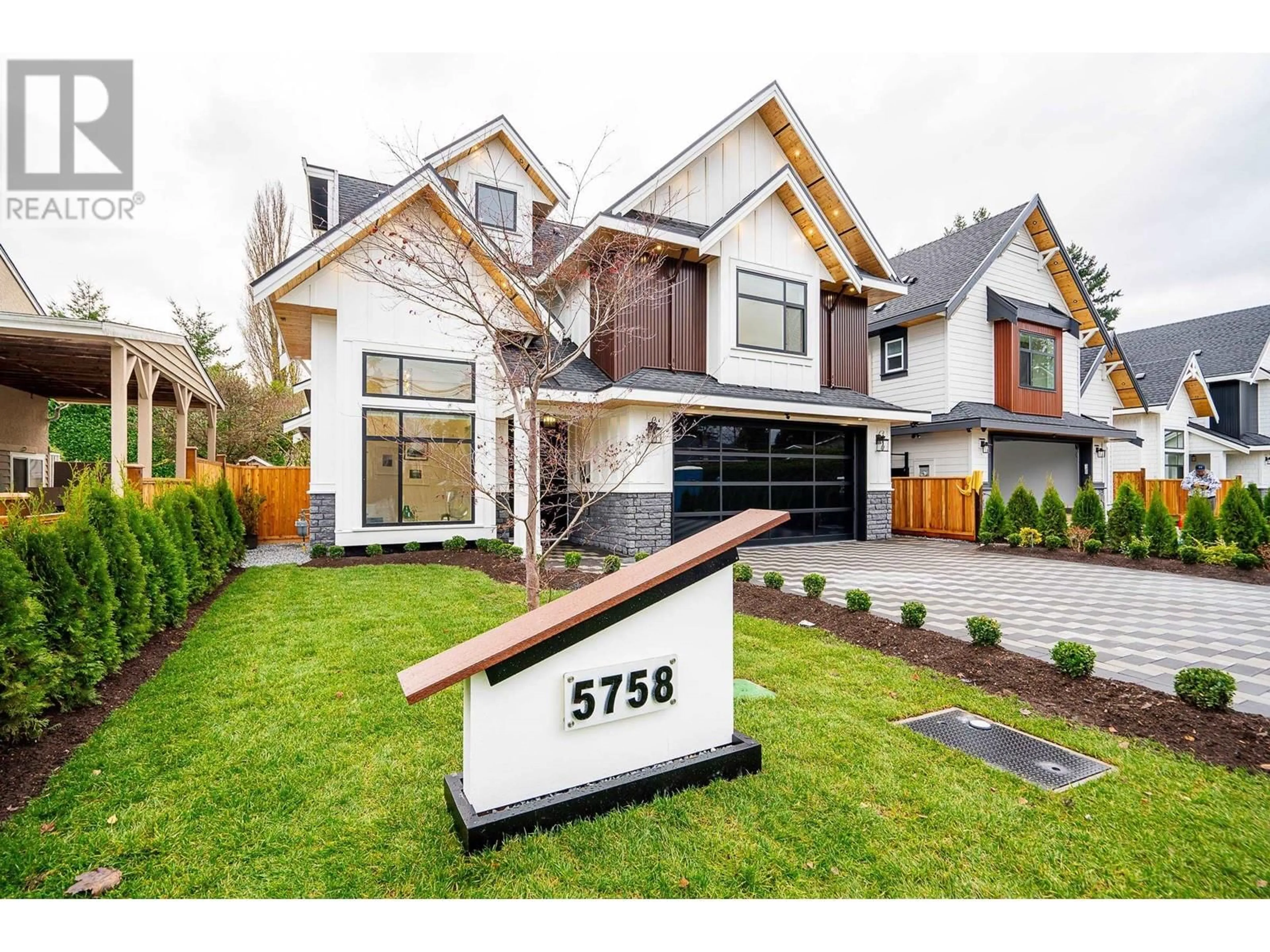 Home with brick exterior material, street for 5758 16A AVENUE, Delta British Columbia V4L1H9