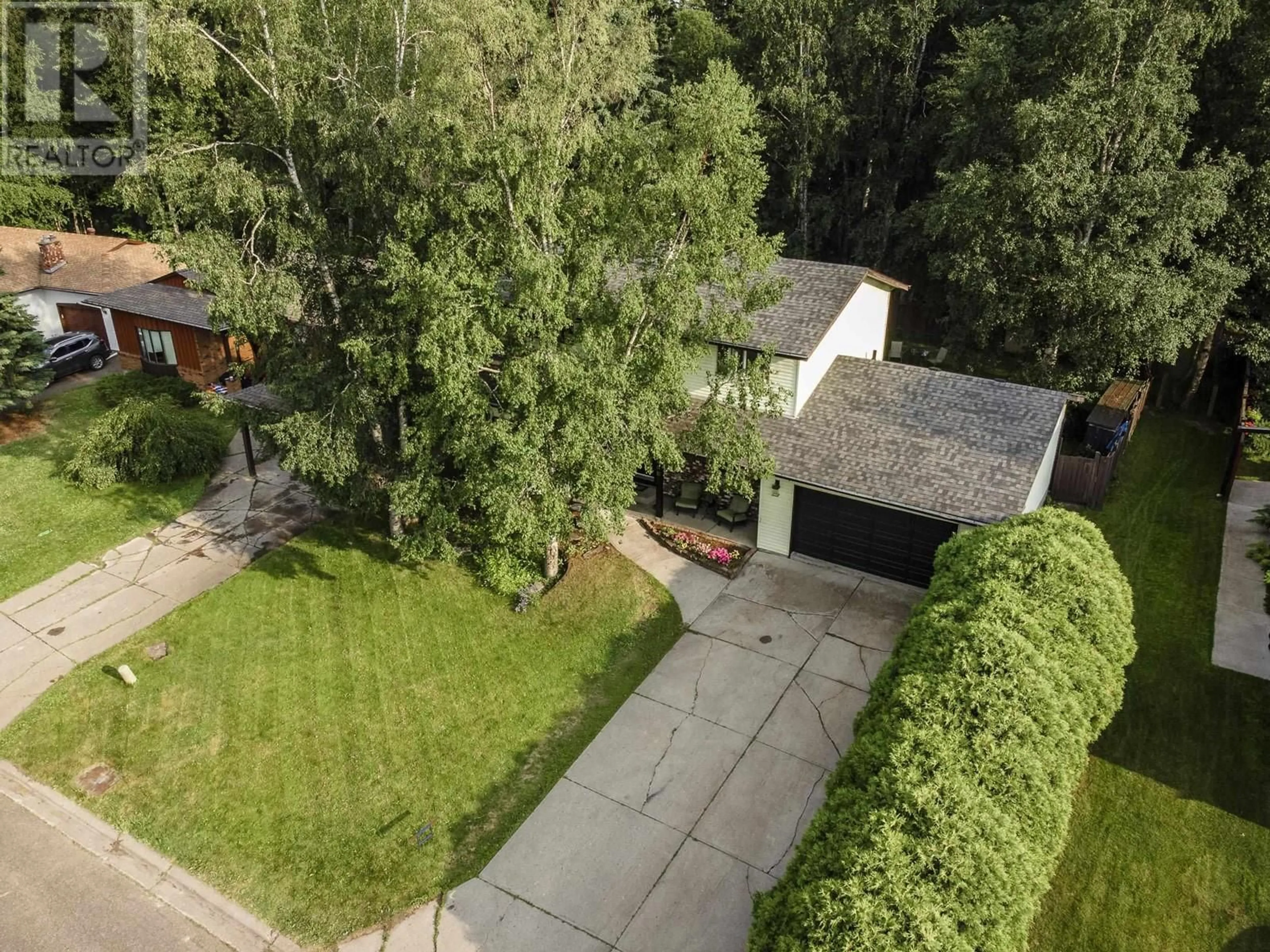 A pic from outside/outdoor area/front of a property/back of a property/a pic from drone, forest/trees view for 8025 NEWCASTLE CRESCENT, Prince George British Columbia V2N3X4