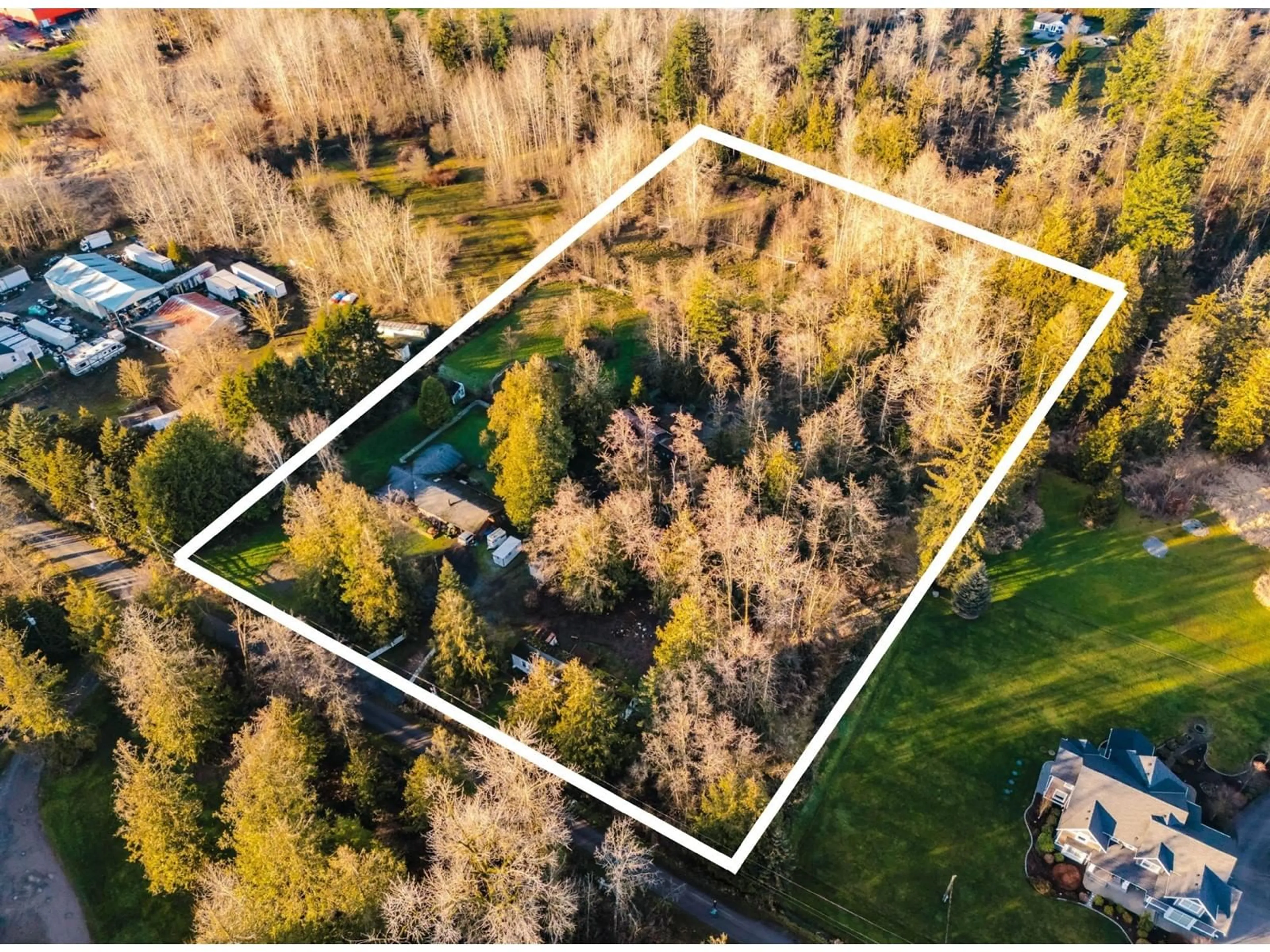 A pic from outside/outdoor area/front of a property/back of a property/a pic from drone, forest/trees view for 25825 38 AVENUE, Langley British Columbia V4W2R4