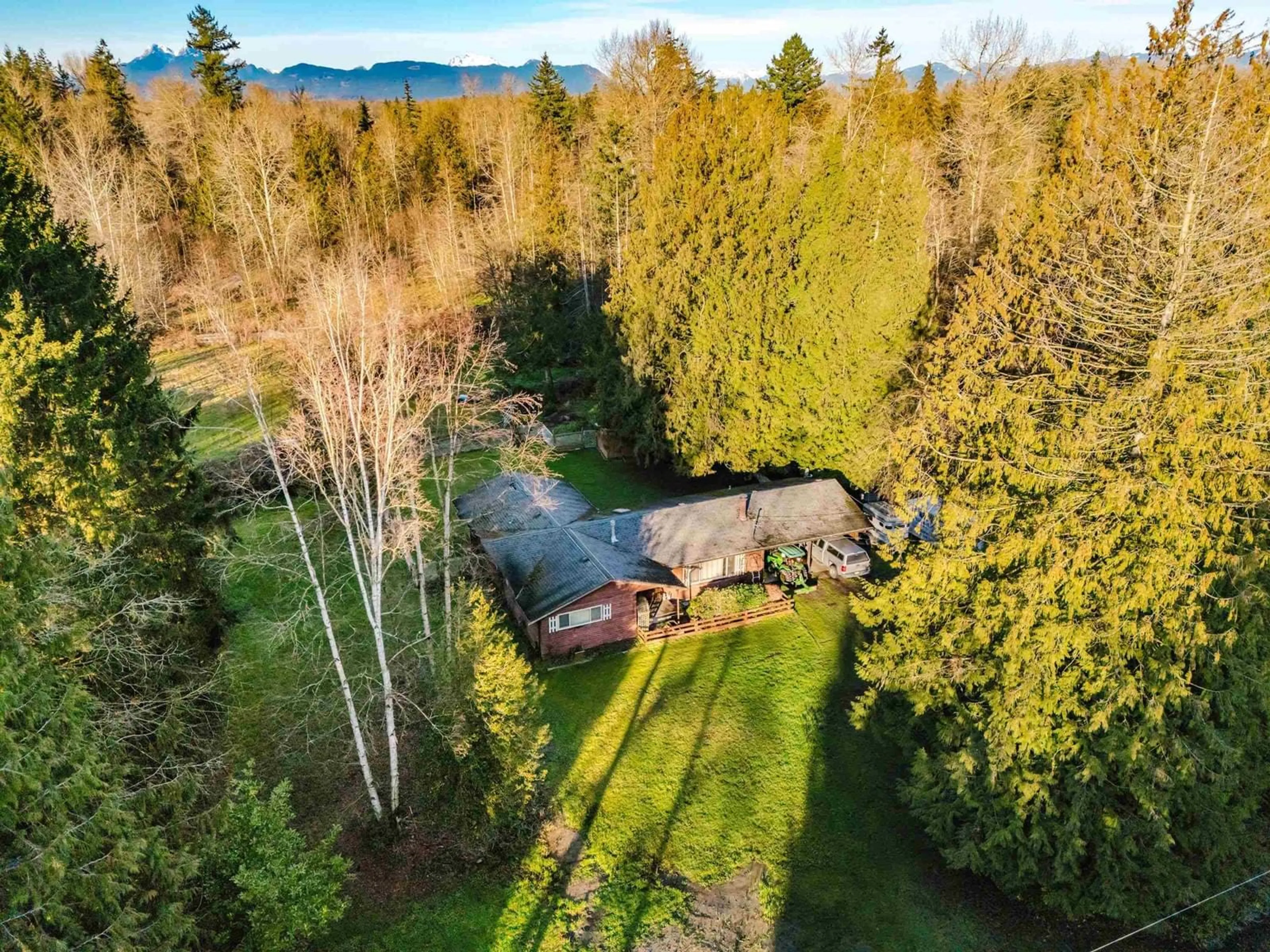 A pic from outside/outdoor area/front of a property/back of a property/a pic from drone, forest/trees view for 25825 38 AVENUE, Langley British Columbia V4W2R4