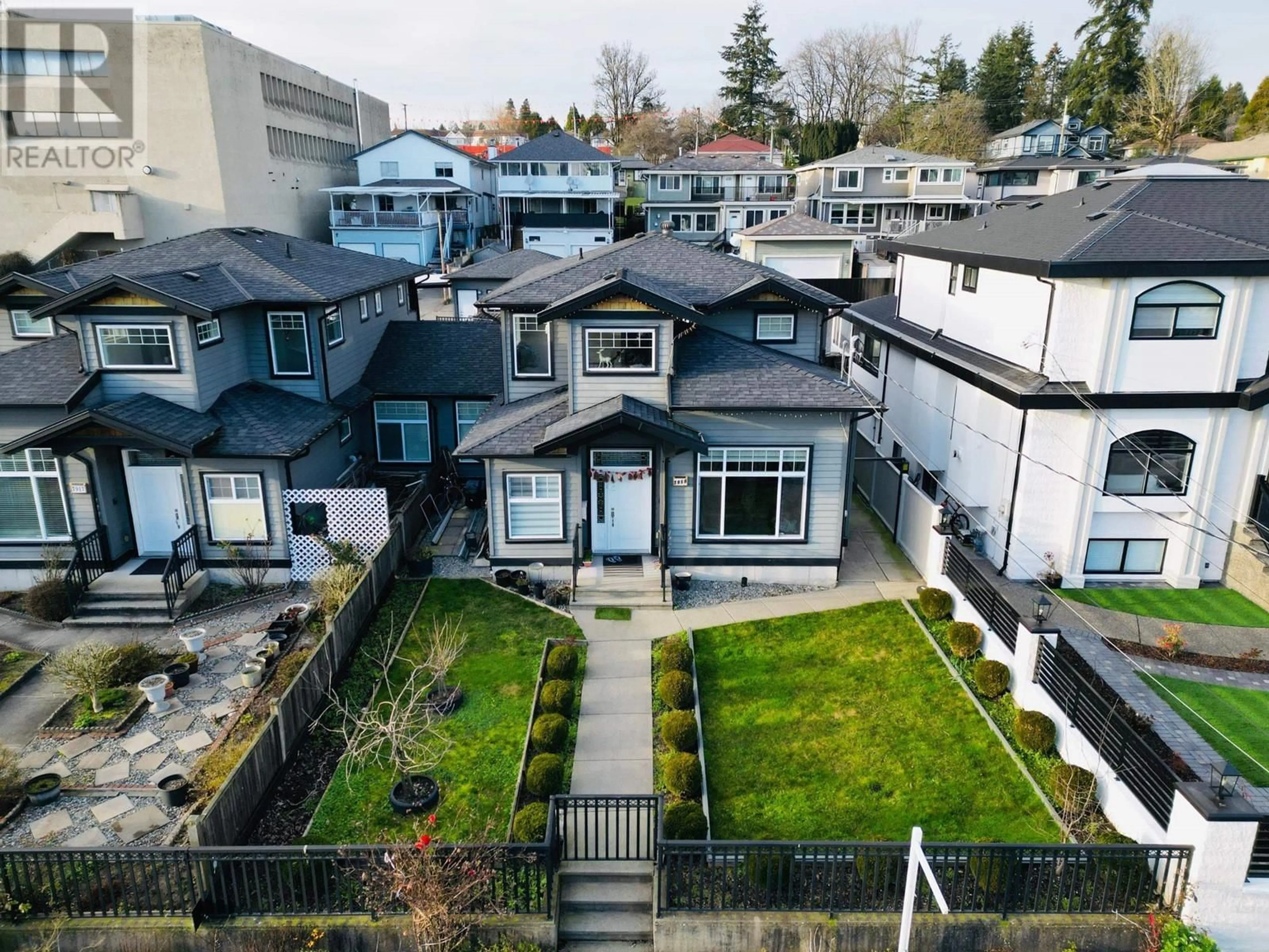 A pic from outside/outdoor area/front of a property/back of a property/a pic from drone, street for 7919 11TH AVENUE, Burnaby British Columbia V3N2N5