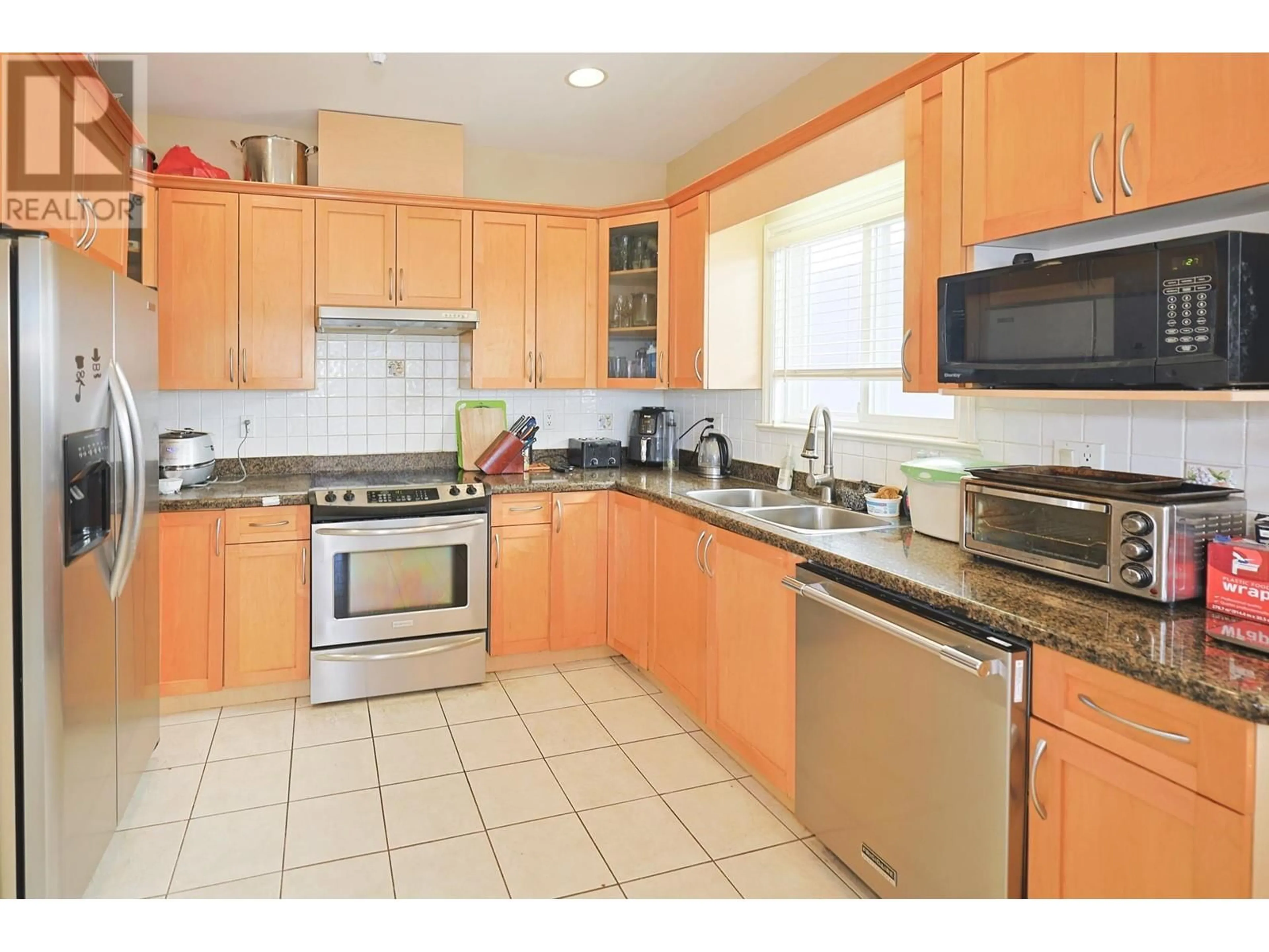 Standard kitchen, ceramic/tile floor for 4888 MANOR STREET, Vancouver British Columbia V5R3Y2