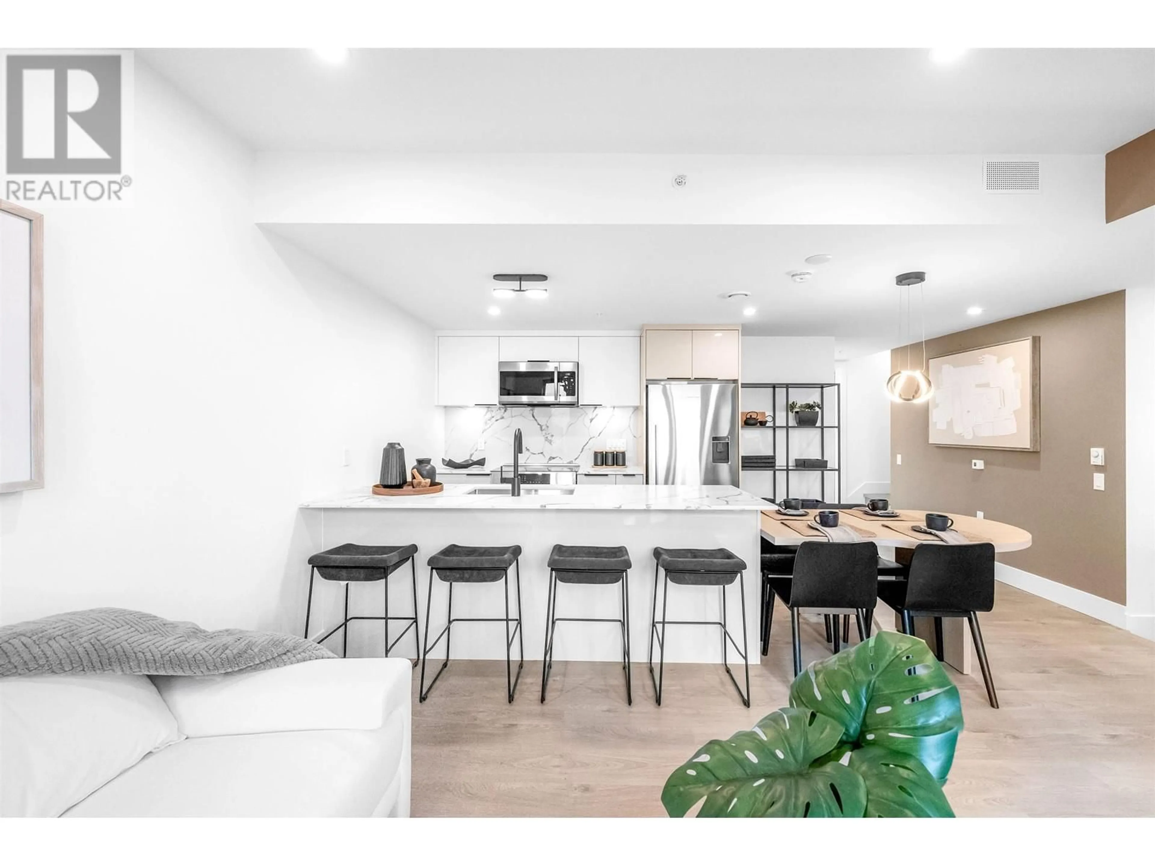 Open concept kitchen, unknown for 101 2073 E 1ST AVENUE, Vancouver British Columbia V5N1B6