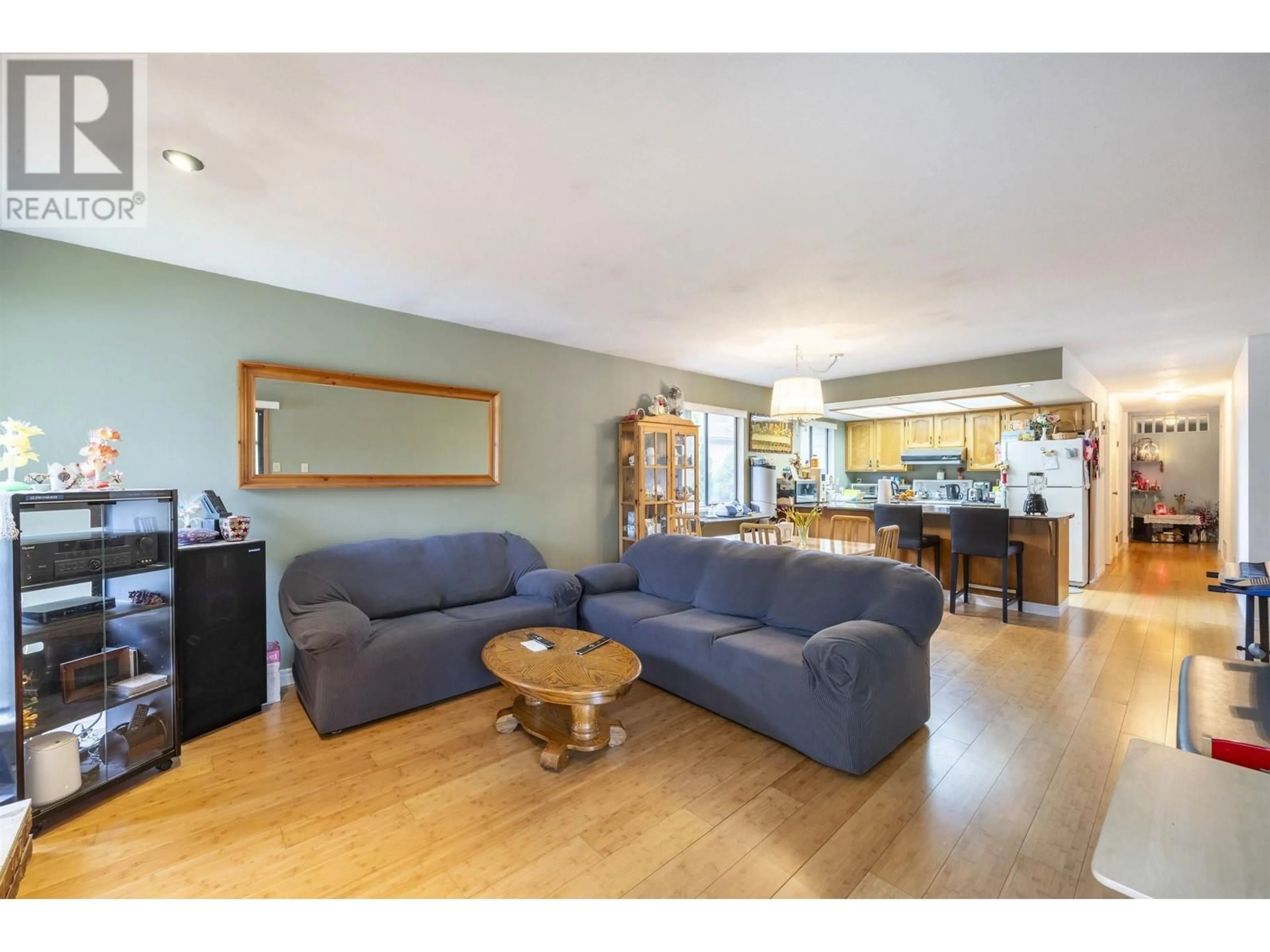 Living room with furniture, wood/laminate floor for 2480 MCLENNAN AVENUE, Richmond British Columbia V6X2N7