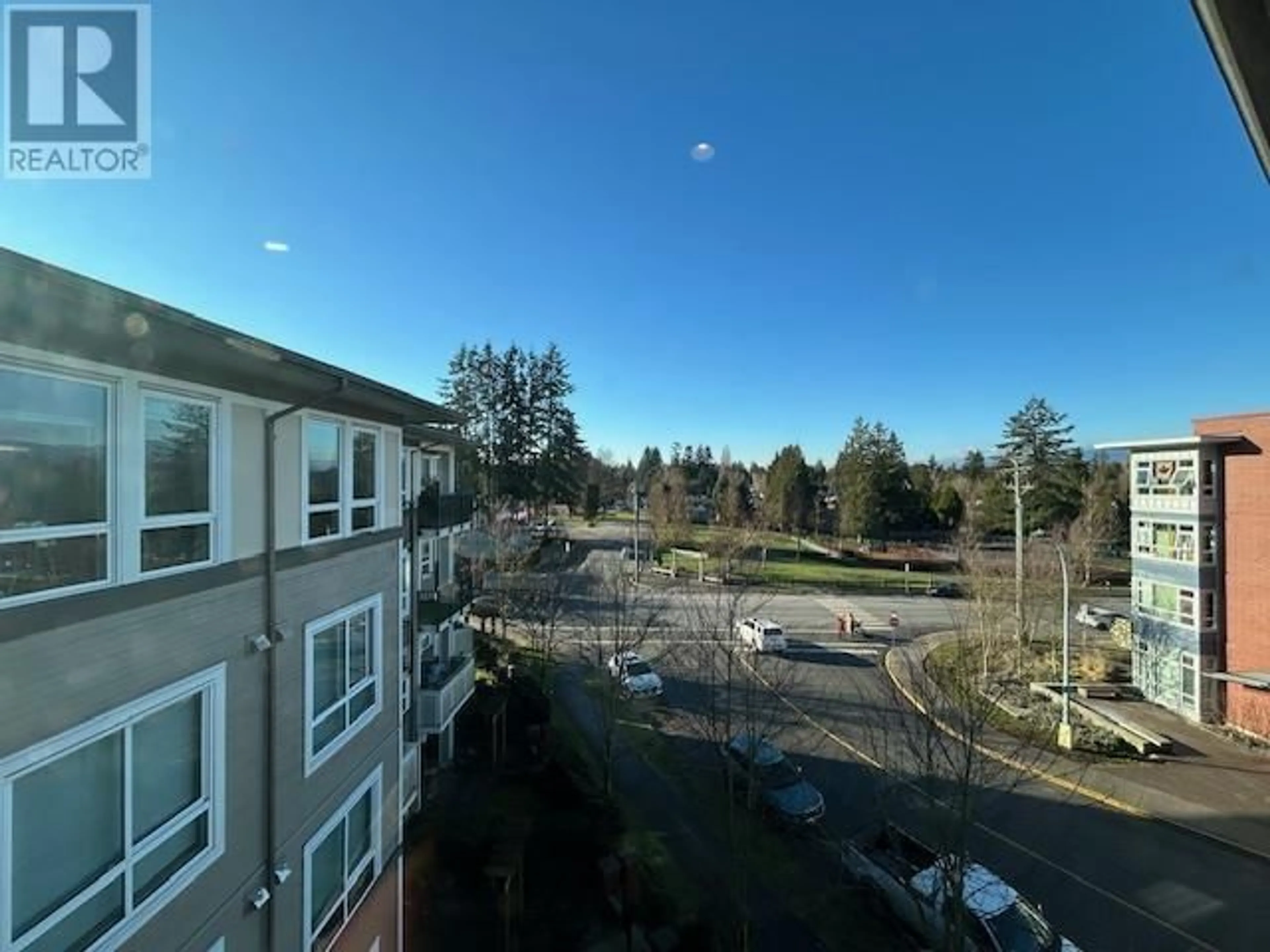 A pic from outside/outdoor area/front of a property/back of a property/a pic from drone, unknown for 410 12040 222 STREET, Maple Ridge British Columbia V2X5W1