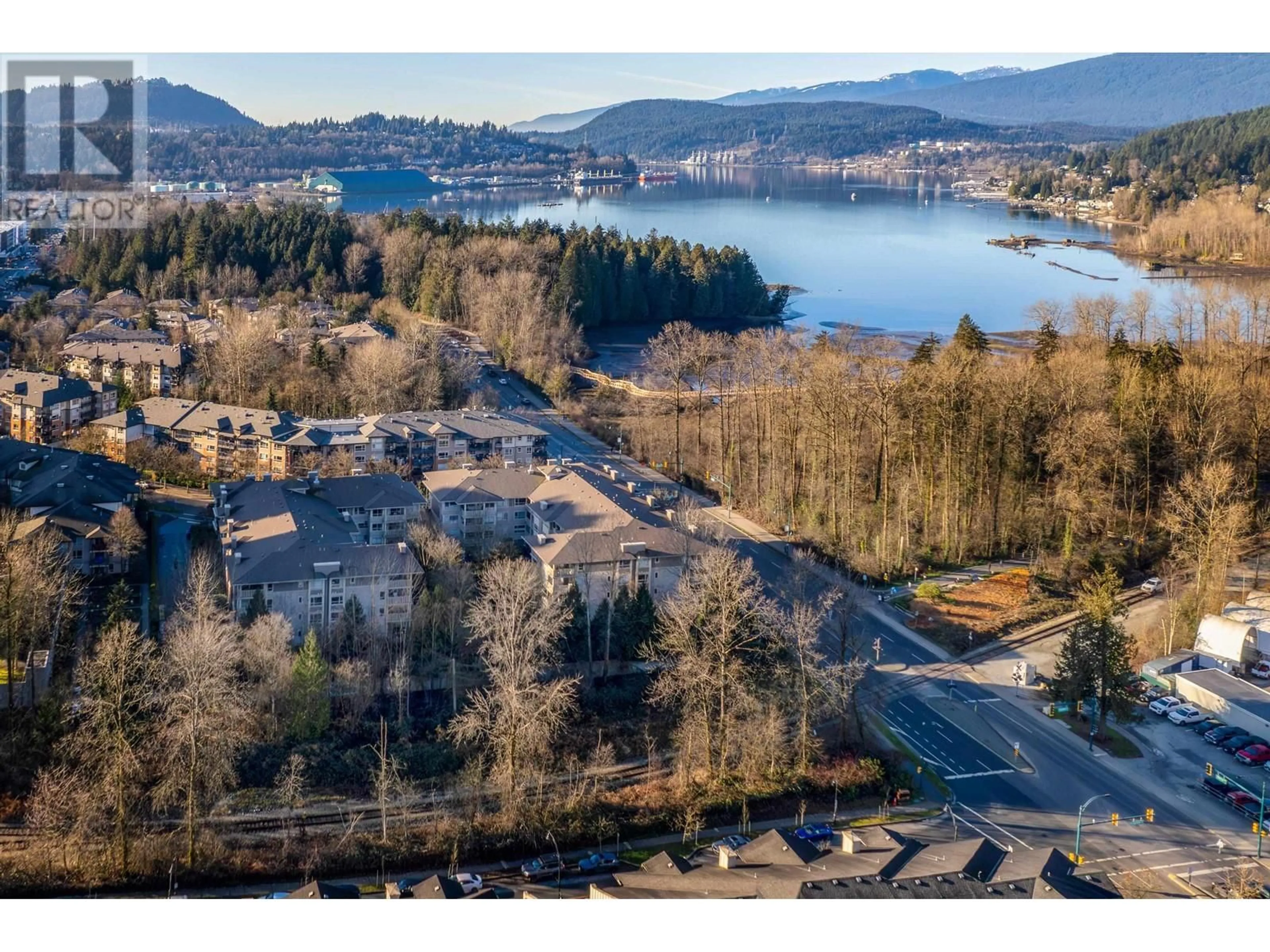 A pic from outside/outdoor area/front of a property/back of a property/a pic from drone, water/lake/river/ocean view for 804 305 MORRISSEY ROAD, Port Moody British Columbia V3H0M3