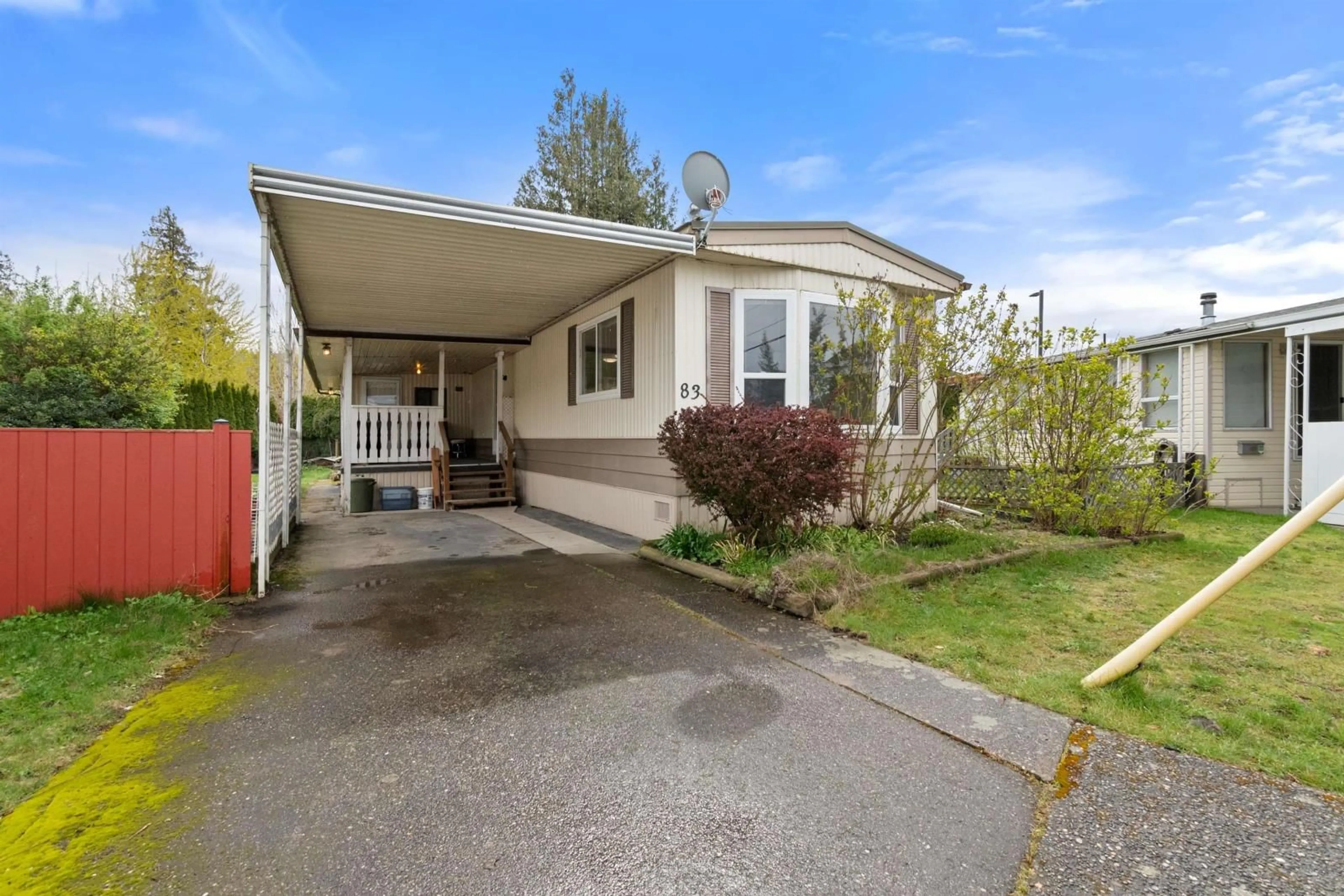 Home with vinyl exterior material, street for 83 6338 VEDDER ROAD|Sardis South, Chilliwack British Columbia V2R3R3