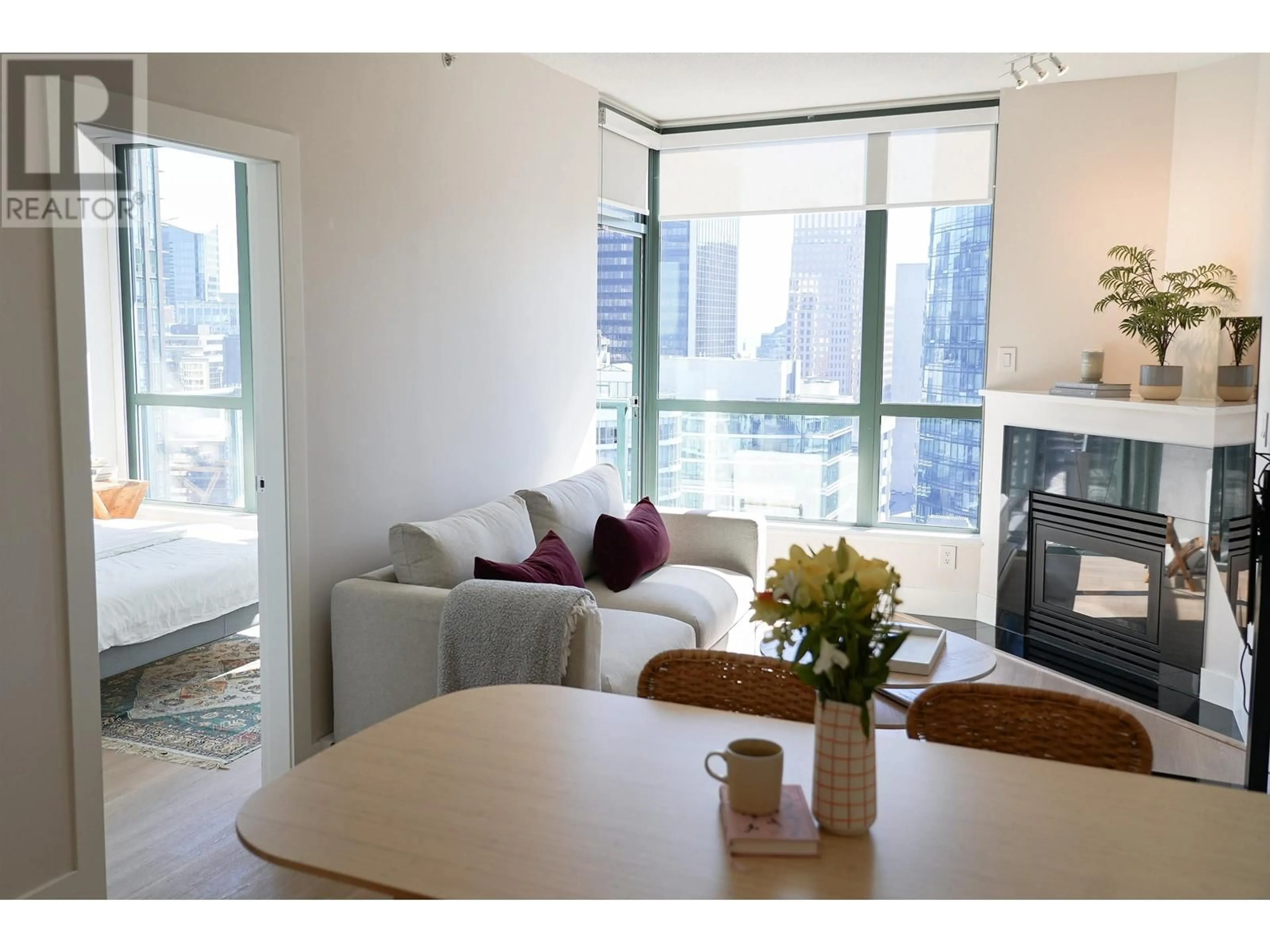 Living room with furniture, wood/laminate floor for 2909 1239 W GEORGIA STREET, Vancouver British Columbia V6E4R8