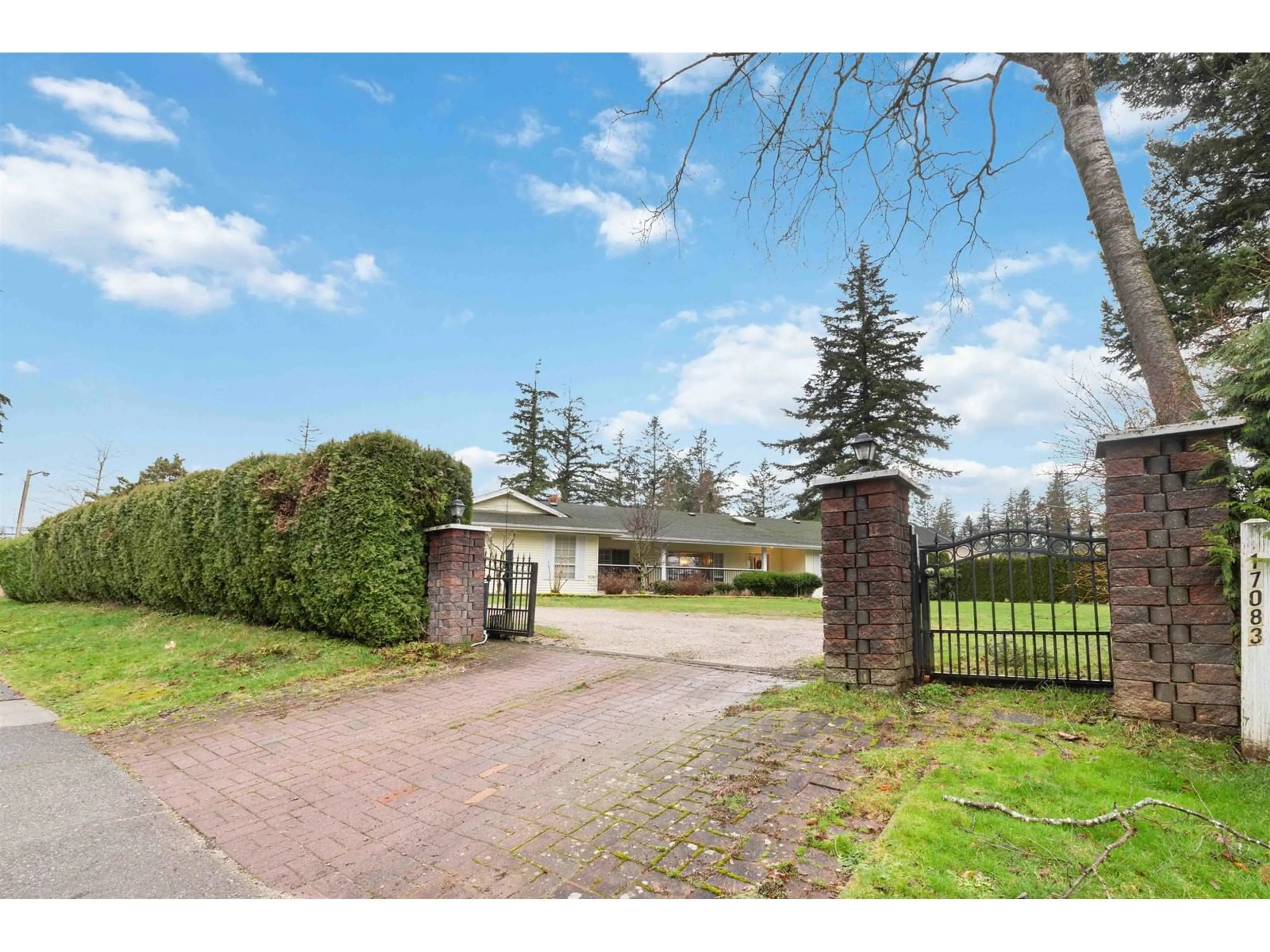 A pic from outside/outdoor area/front of a property/back of a property/a pic from drone, street for 17083 26, Surrey British Columbia V3Z0A4