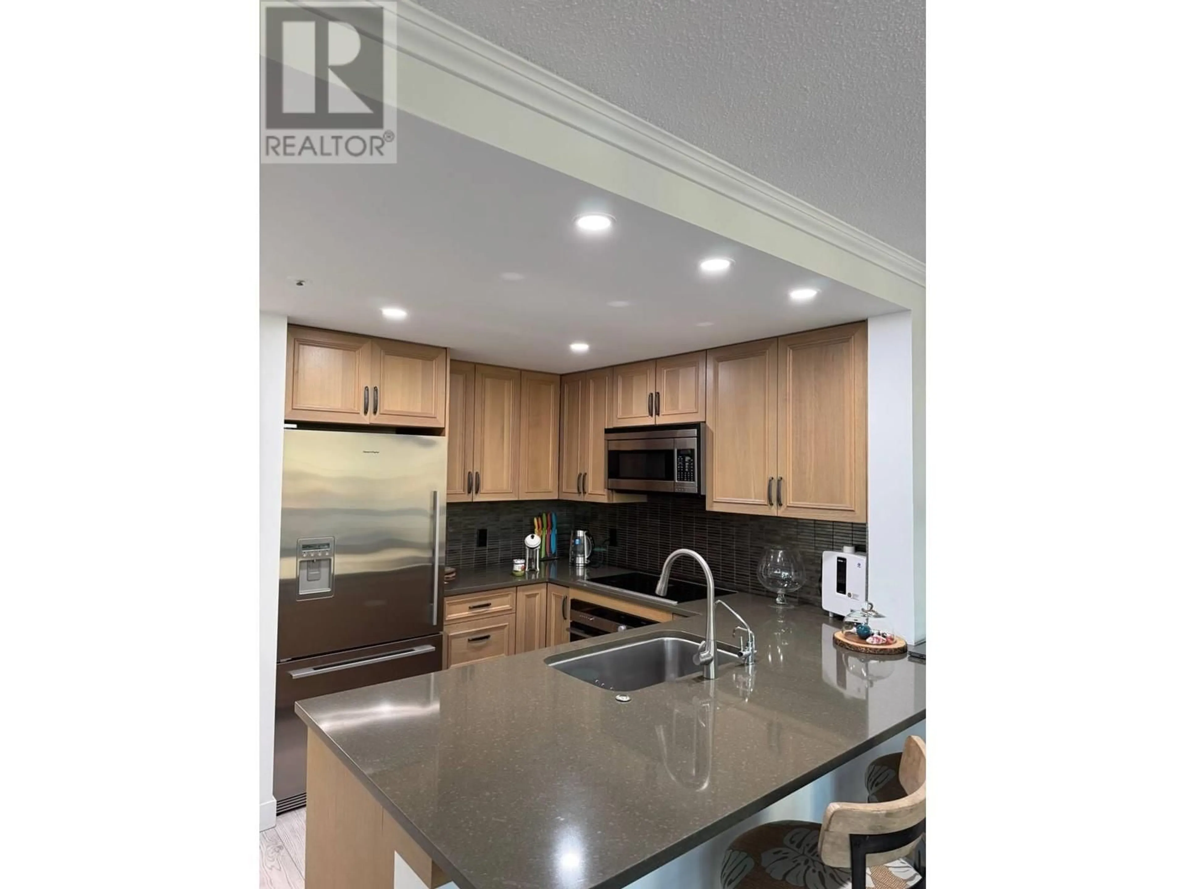 Open concept kitchen, unknown for 702 588 BROUGHTON STREET, Vancouver British Columbia V6G3E3