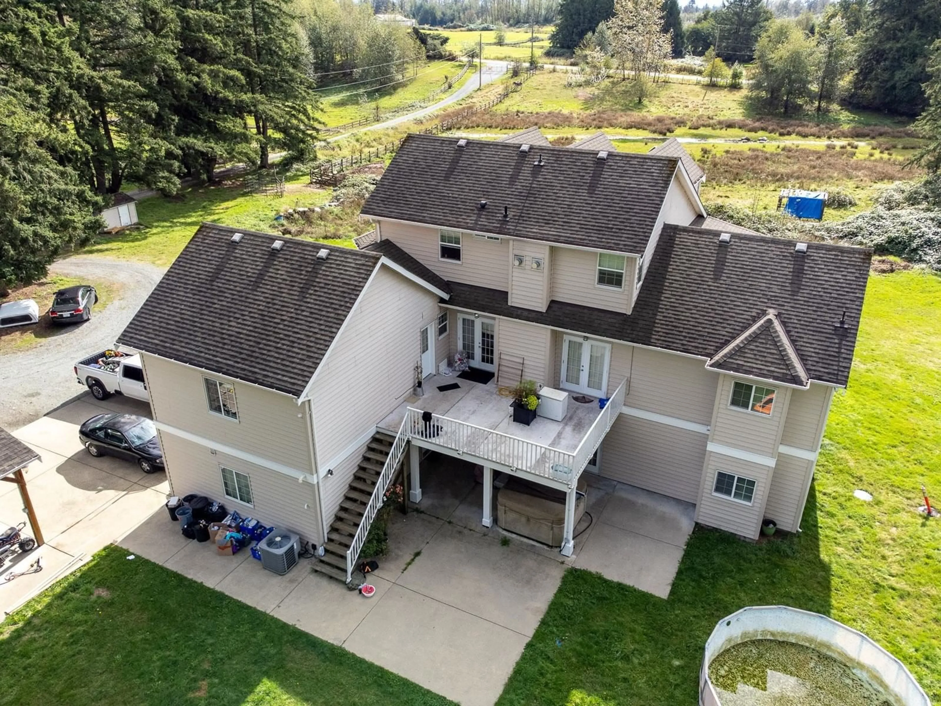 A pic from outside/outdoor area/front of a property/back of a property/a pic from drone, unknown for 25039 8 AVENUE, Langley British Columbia V4W2G5