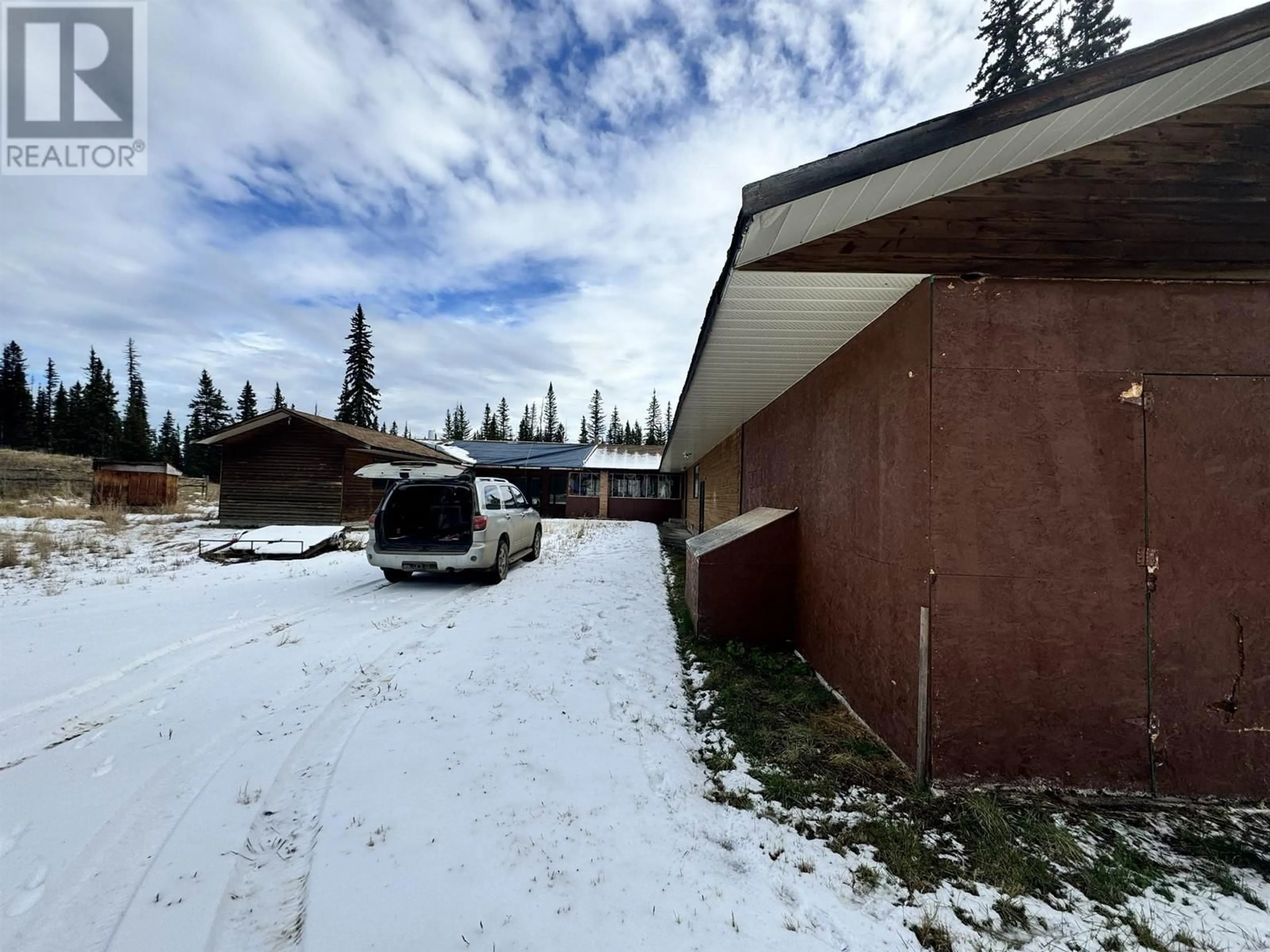 A pic from outside/outdoor area/front of a property/back of a property/a pic from drone, mountain view for 7165 CARIBOO 97 HIGHWAY, 100 Mile House British Columbia V0K2E2