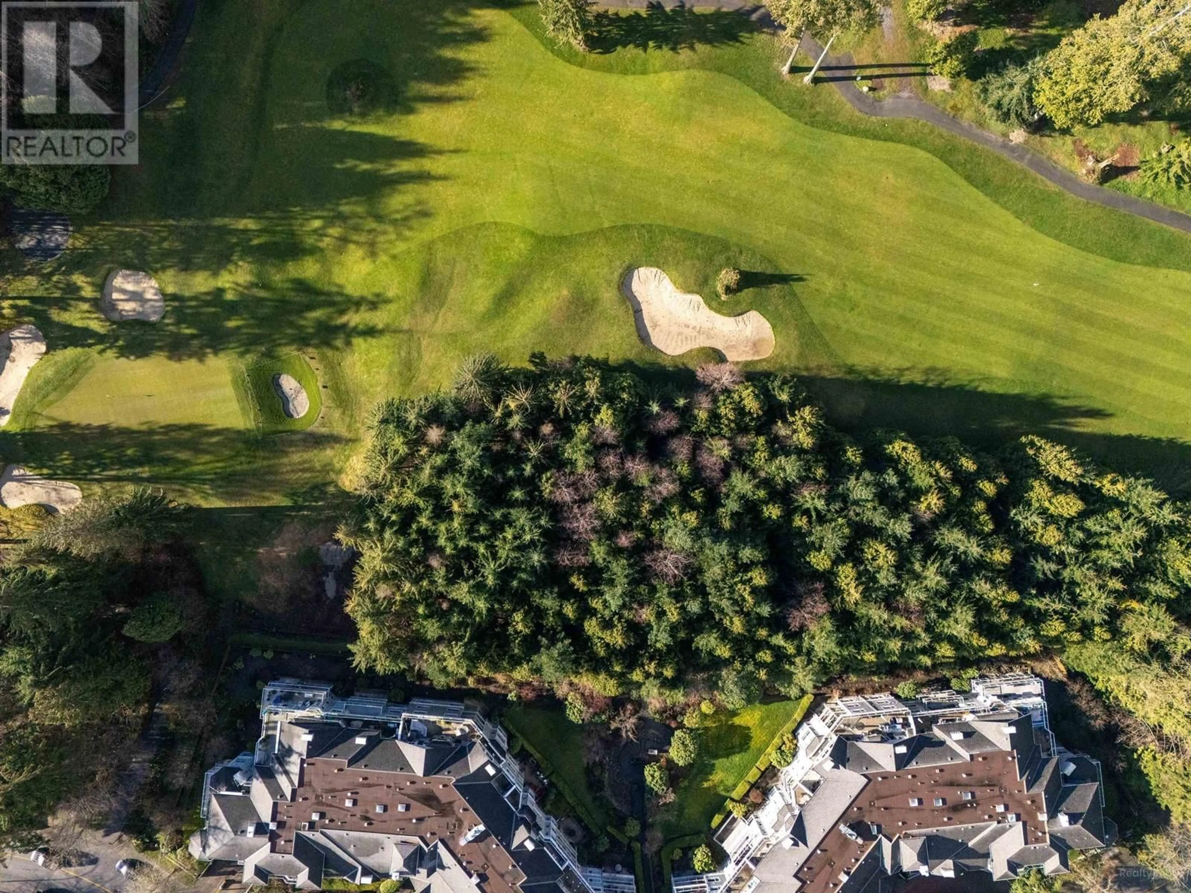 A pic from outside/outdoor area/front of a property/back of a property/a pic from drone, forest/trees view for 203 1281 PARKGATE AVENUE, North Vancouver British Columbia V7H3A3