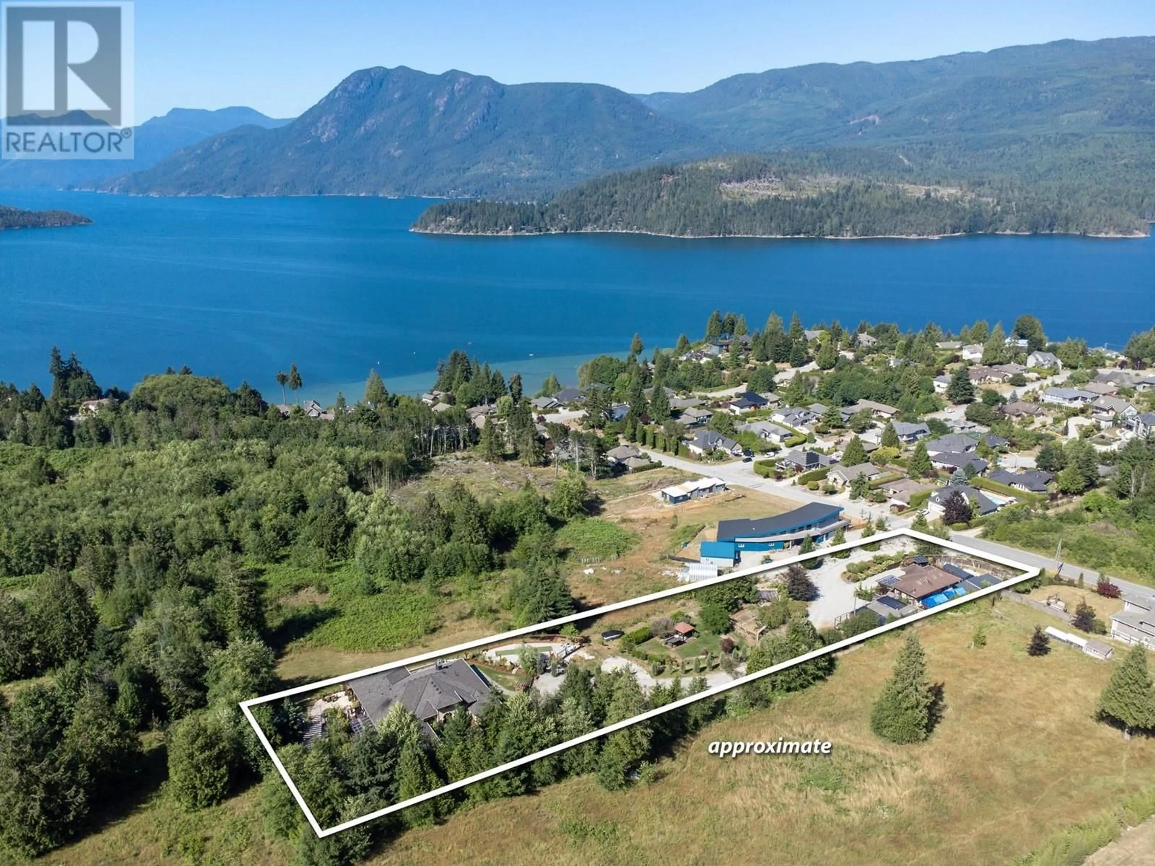 A pic from outside/outdoor area/front of a property/back of a property/a pic from drone, water/lake/river/ocean view for 6391&93 SANDPIPER ROAD, Sechelt British Columbia V7Z0L1