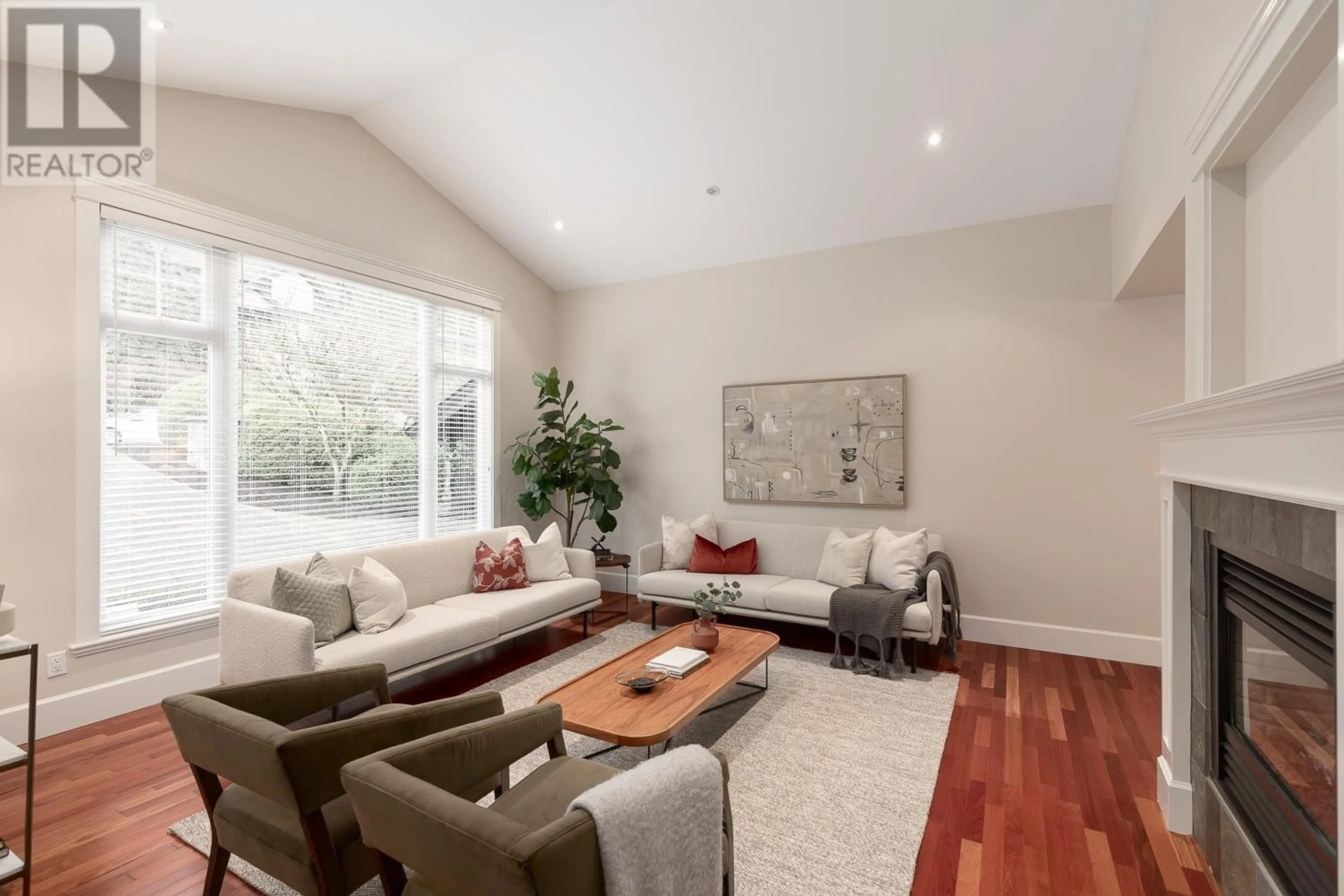 Living room with furniture, wood/laminate floor for 3443 ANNE MACDONALD WAY, North Vancouver British Columbia V7G2S7