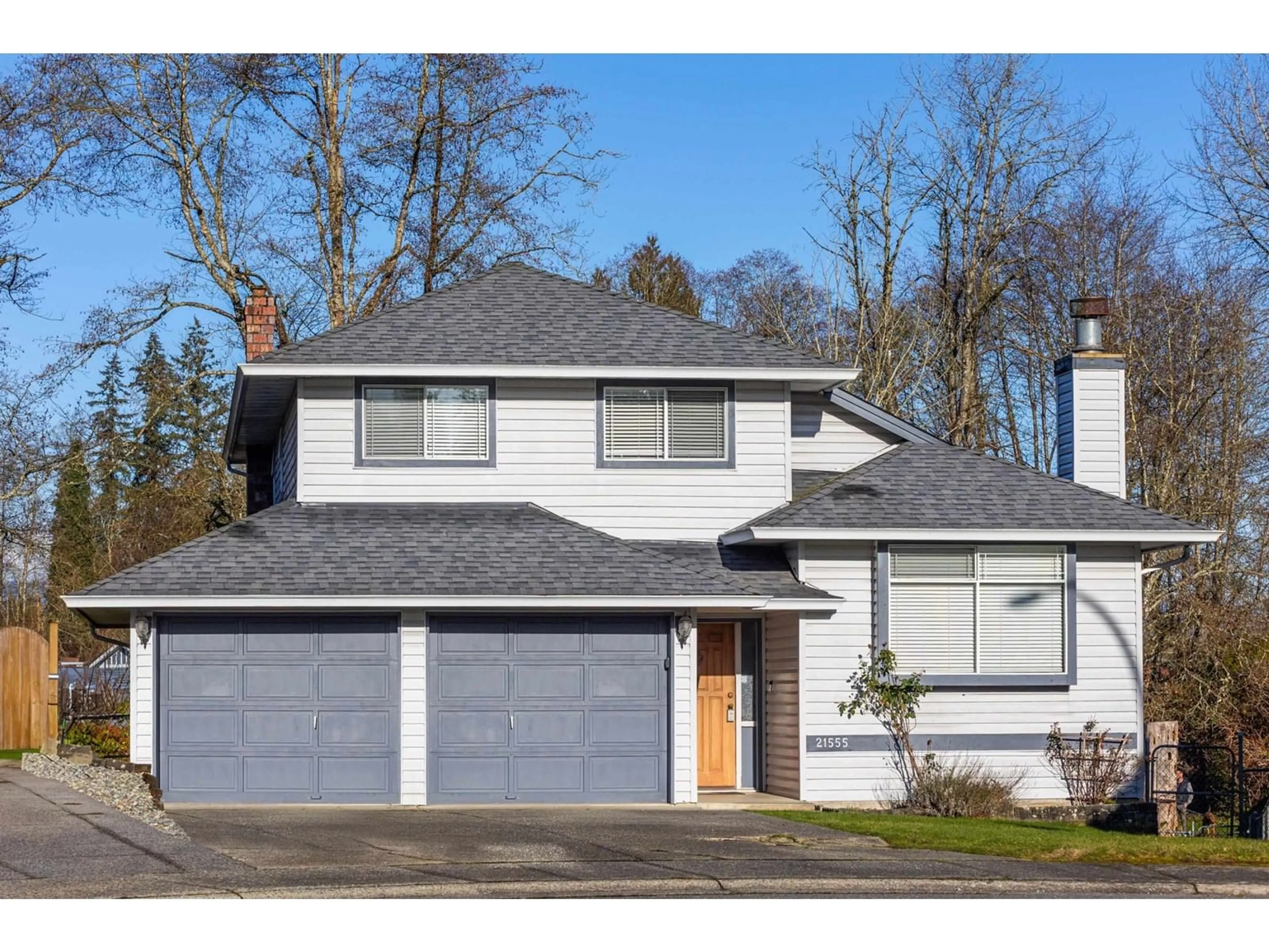 Home with vinyl exterior material, street for 21555 93B AVENUE, Langley British Columbia V1M2A3