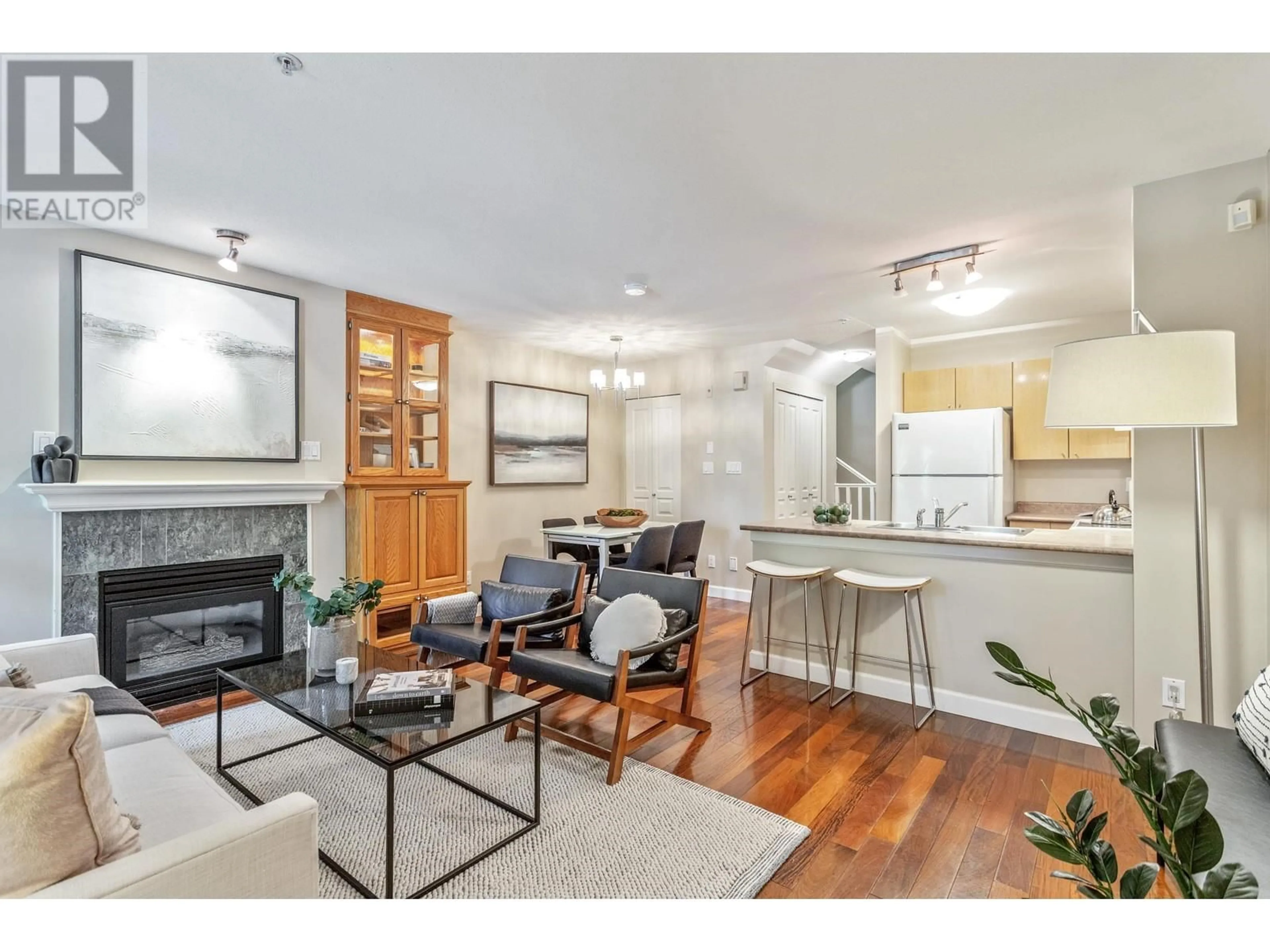 Living room with furniture, wood/laminate floor for 3238 HEATHER STREET, Vancouver British Columbia V5Z4R9