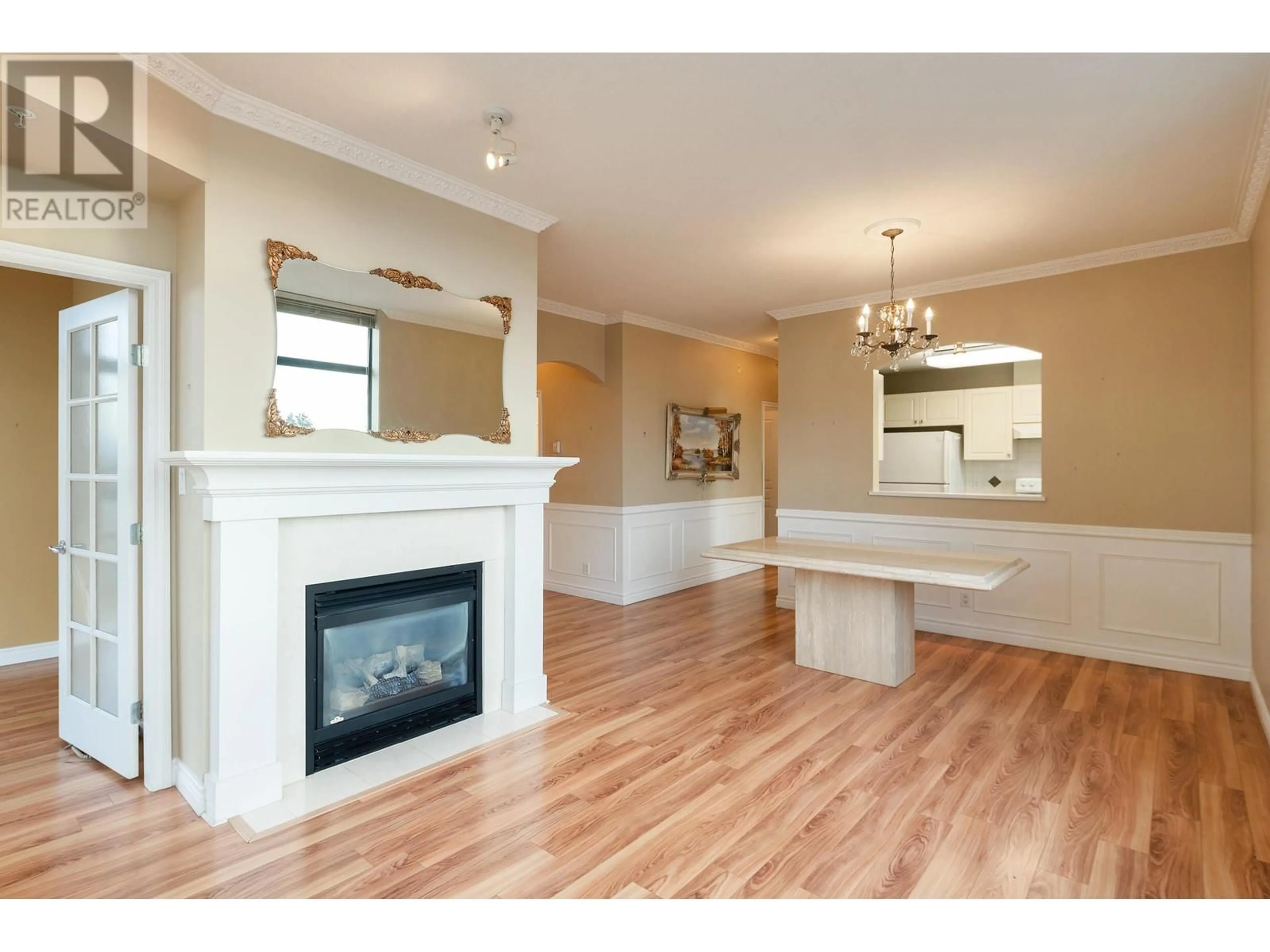 Open concept kitchen, wood/laminate floor for 501 - 538 45TH AVENUE, Vancouver British Columbia V5Z4S3