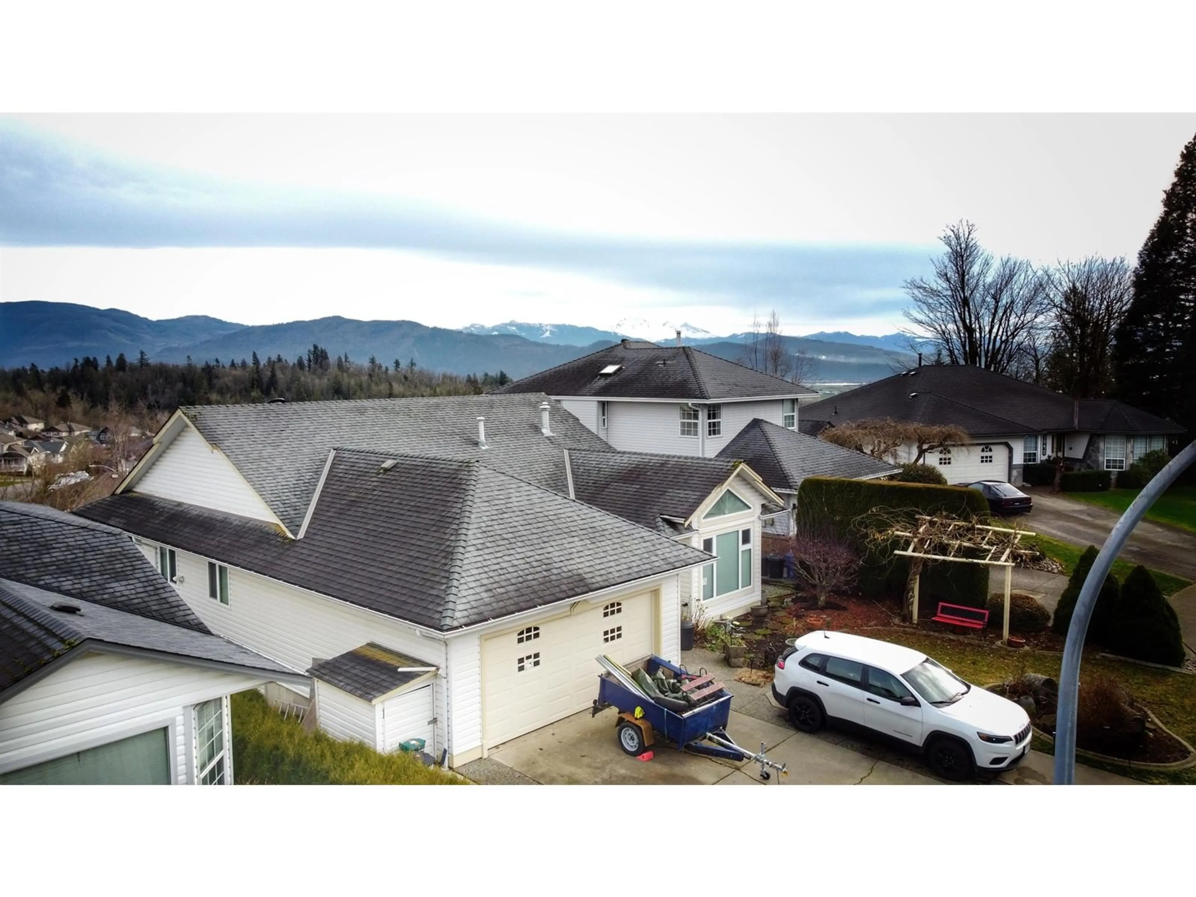 A pic from outside/outdoor area/front of a property/back of a property/a pic from drone, mountain view for 8064 FORBES STREET, Mission British Columbia V2V6L6