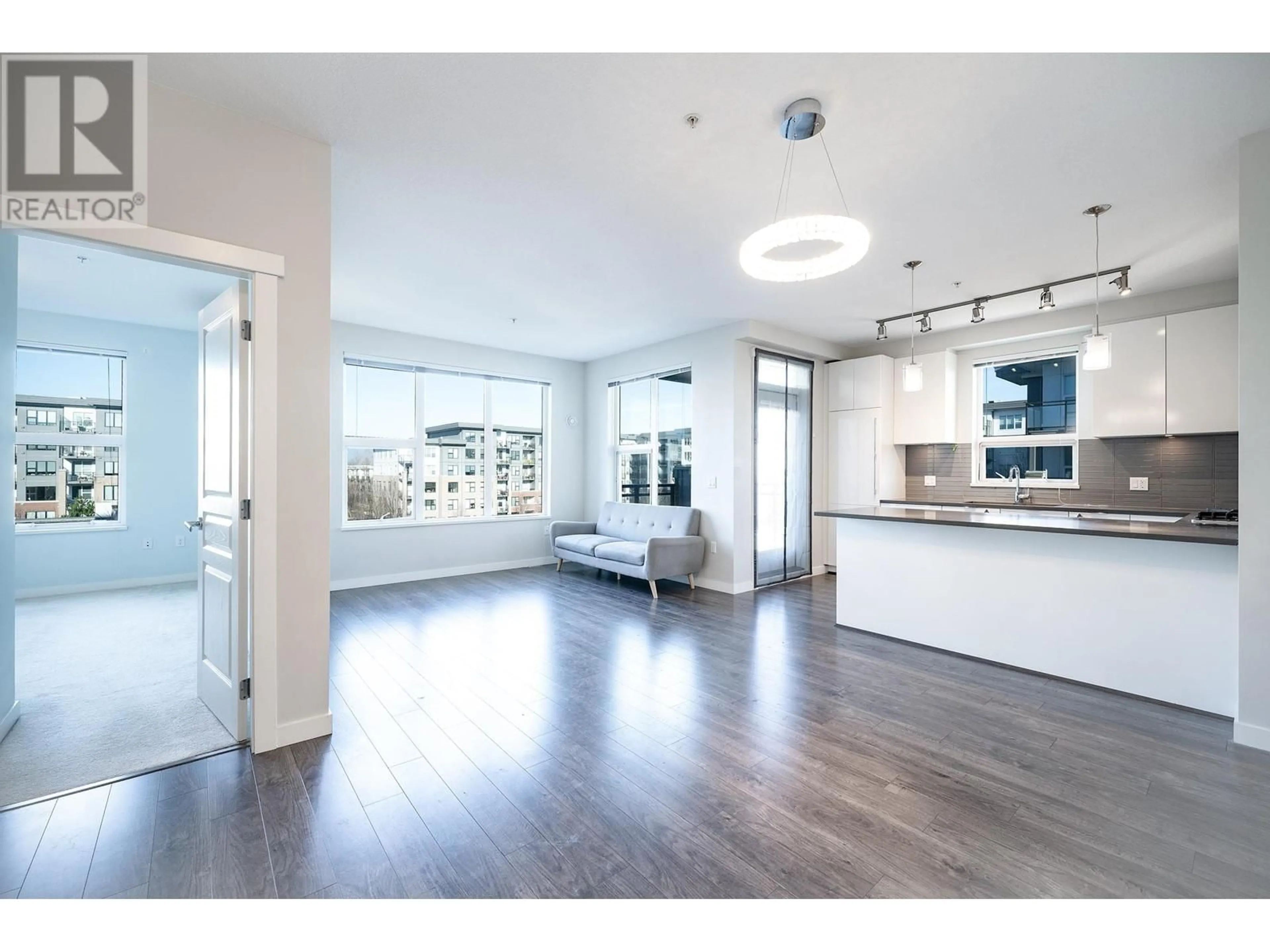 Open concept kitchen, wood/laminate floor for 405 9311 ALEXANDRA ROAD, Richmond British Columbia V6X0L8