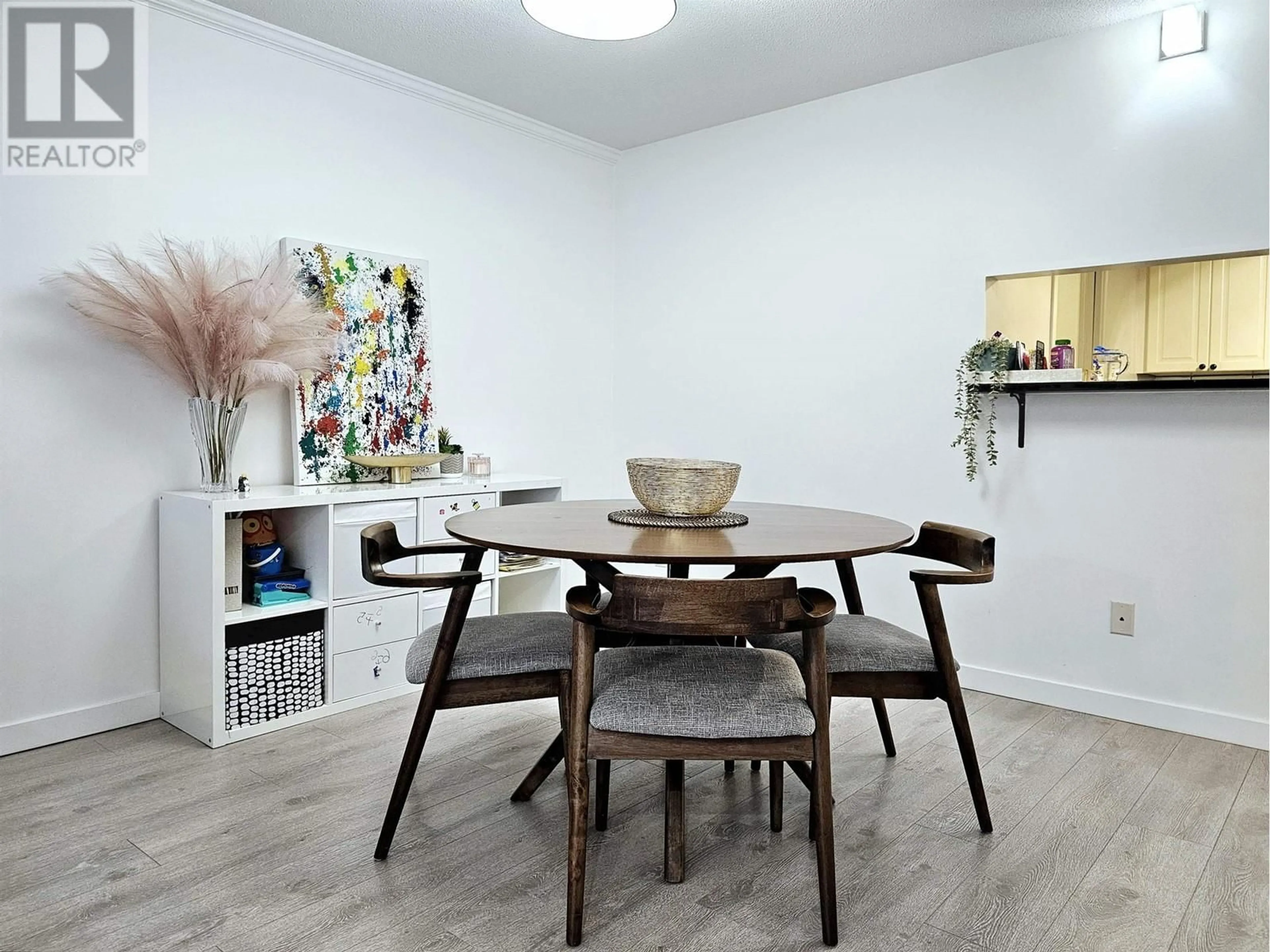 Dining room, wood/laminate floor for 106 8120 BENNETT ROAD, Richmond British Columbia V6Y1N5