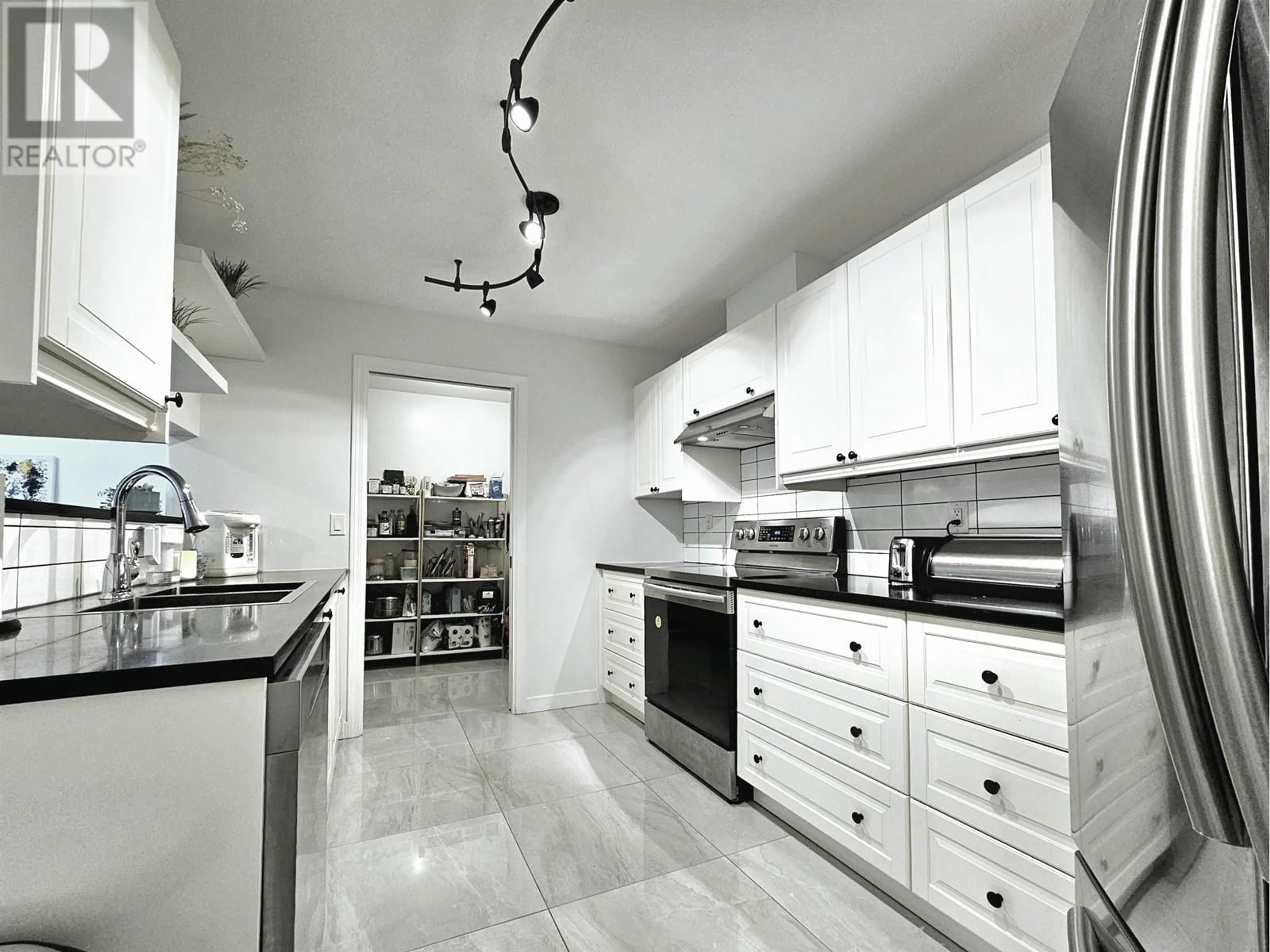 Contemporary kitchen, ceramic/tile floor for 106 8120 BENNETT ROAD, Richmond British Columbia V6Y1N5