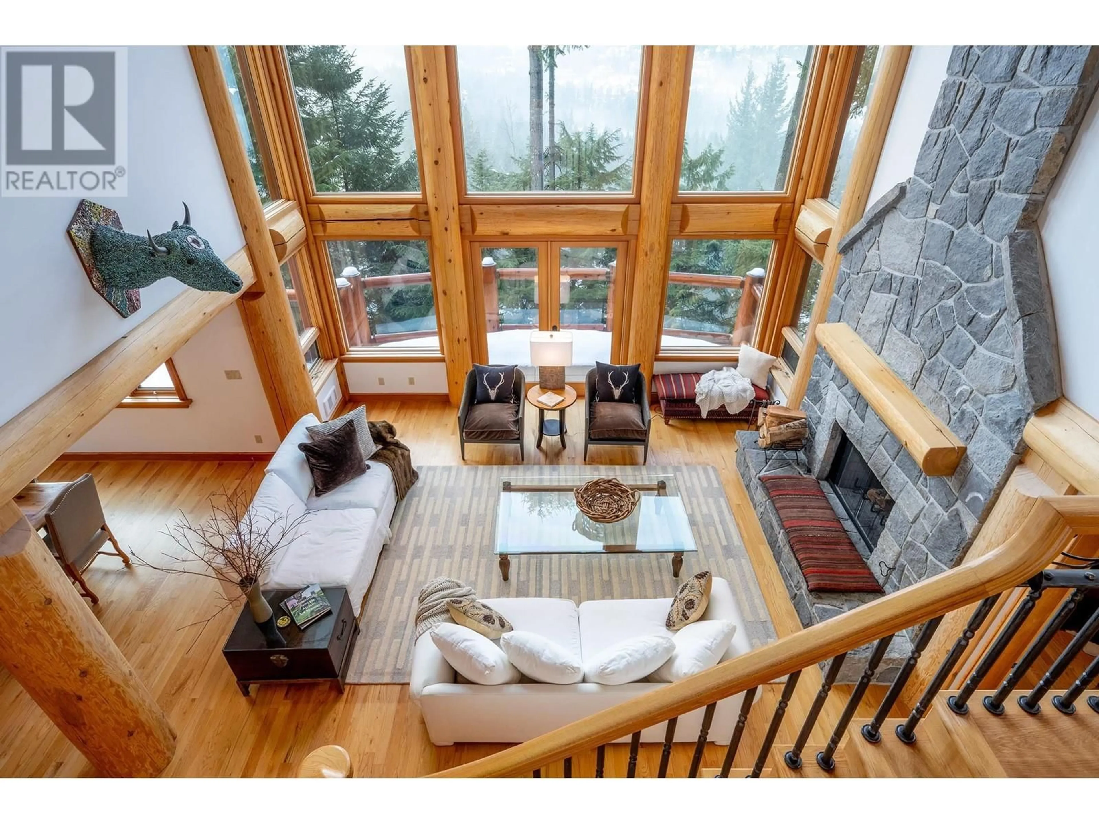 Living room with furniture, wood/laminate floor for 3826 SUNRIDGE DRIVE, Whistler British Columbia V8E0W1