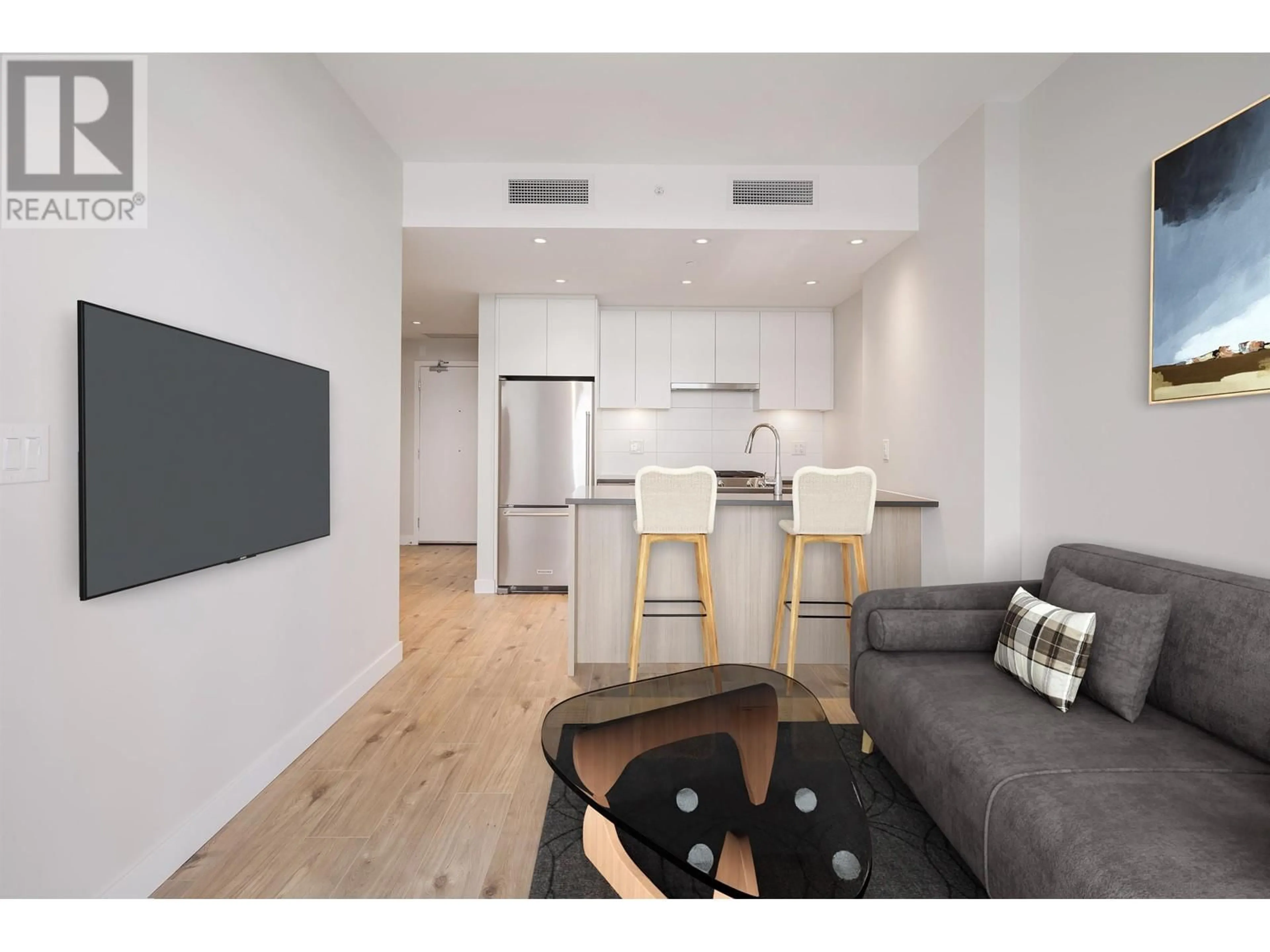 Living room with furniture, wood/laminate floor for 1502 - 3430 KENT AVENUE SOUTH, Vancouver British Columbia V5S0G7