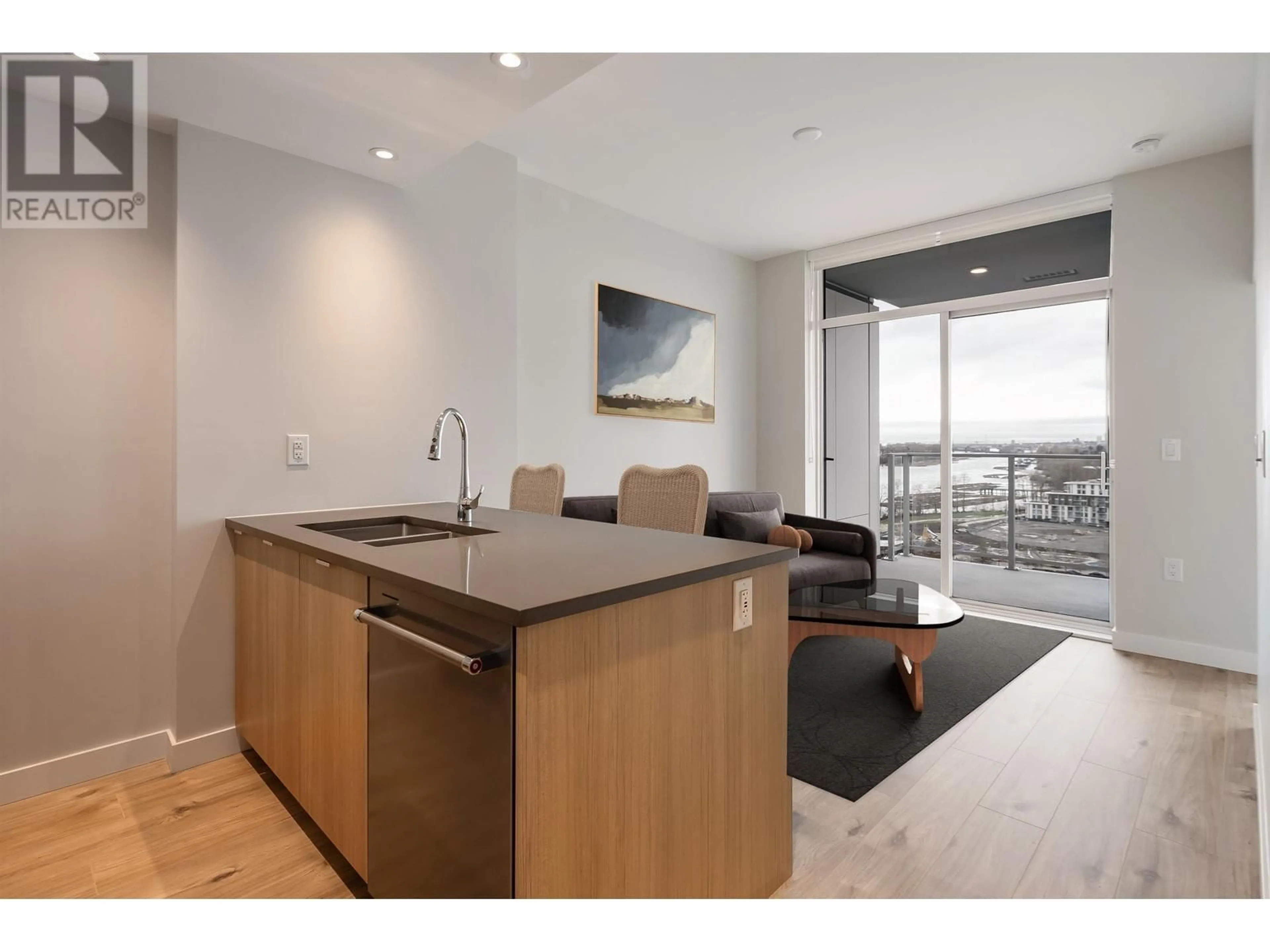 Open concept kitchen, wood/laminate floor for 1502 - 3430 KENT AVENUE SOUTH, Vancouver British Columbia V5S0G7
