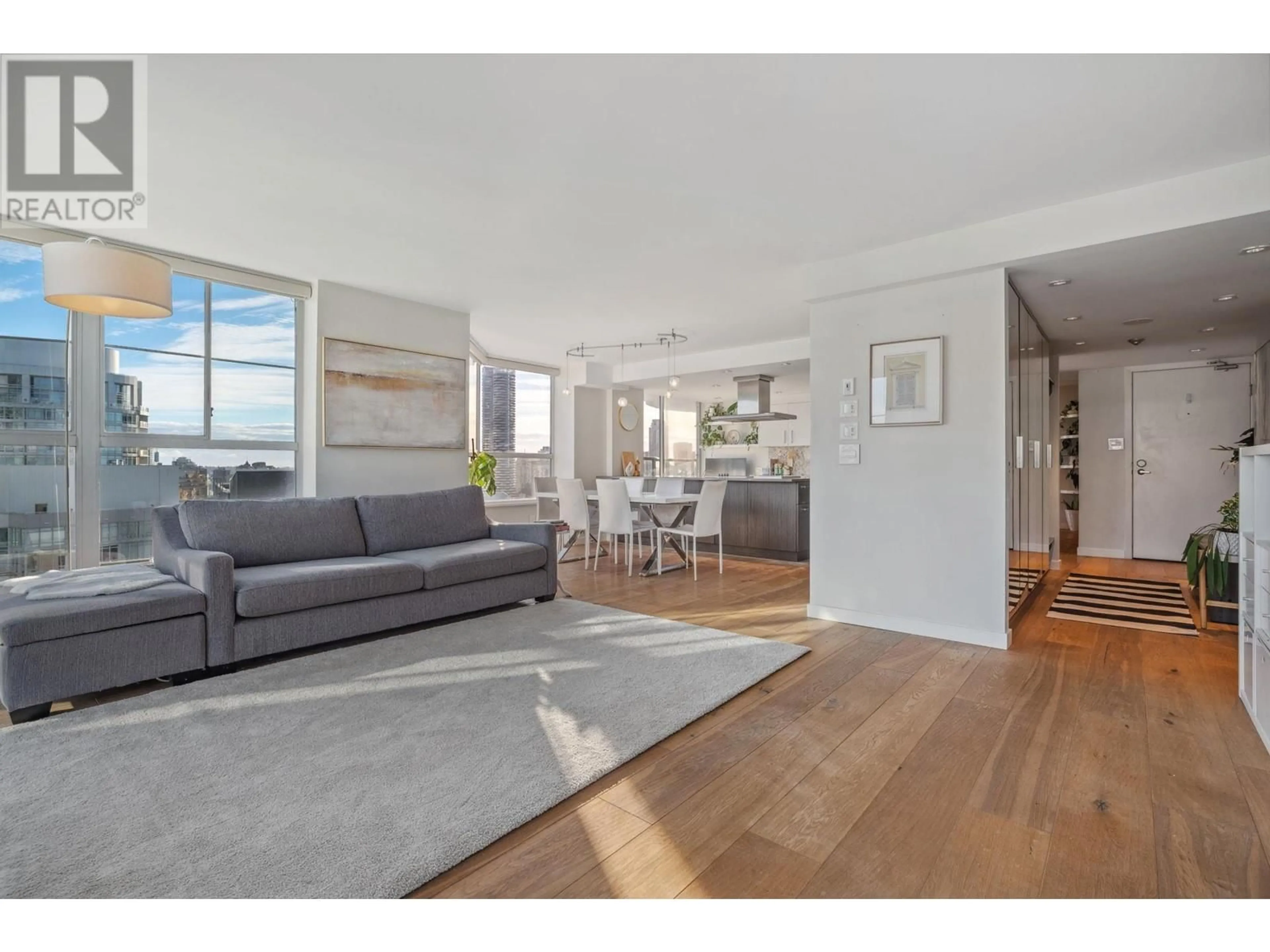 Living room with furniture, wood/laminate floor for 2702 717 JERVIS STREET, Vancouver British Columbia V6E4L5