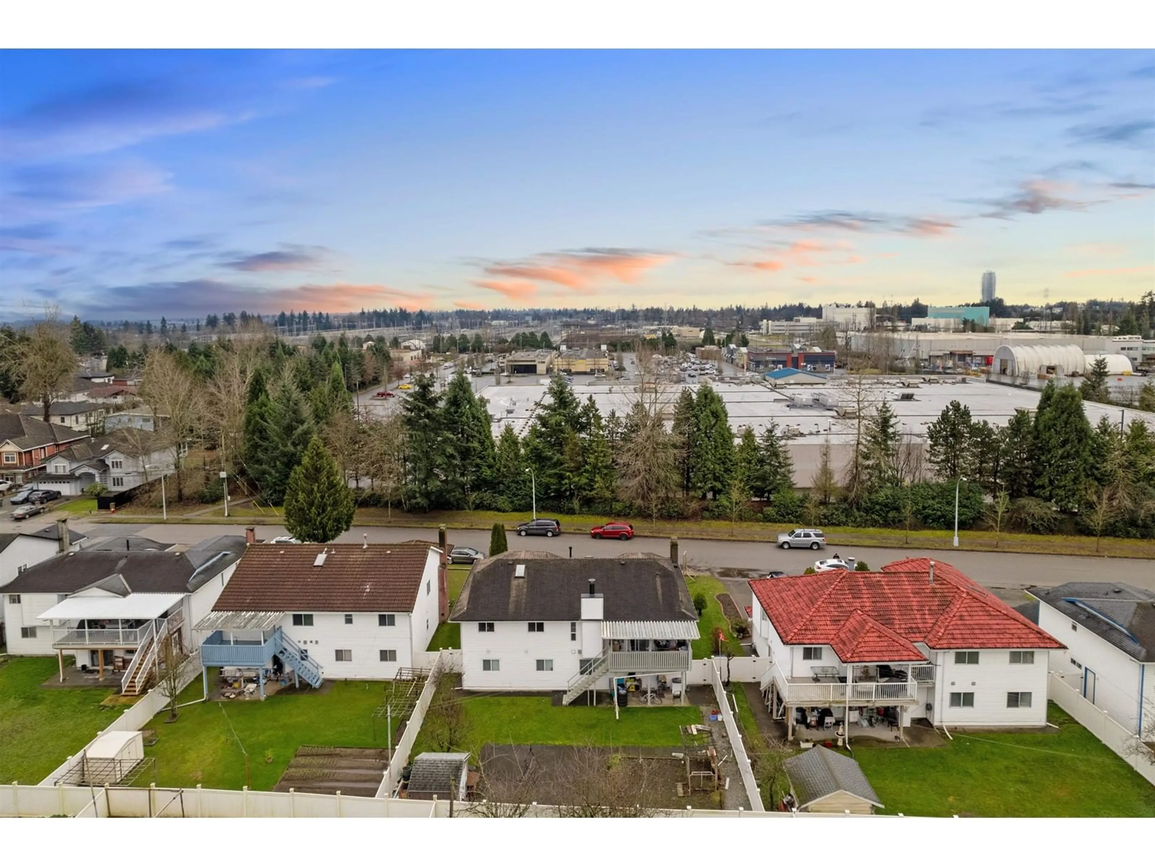 A pic from outside/outdoor area/front of a property/back of a property/a pic from drone, water/lake/river/ocean view for 12475 90, Surrey British Columbia V3V1B9