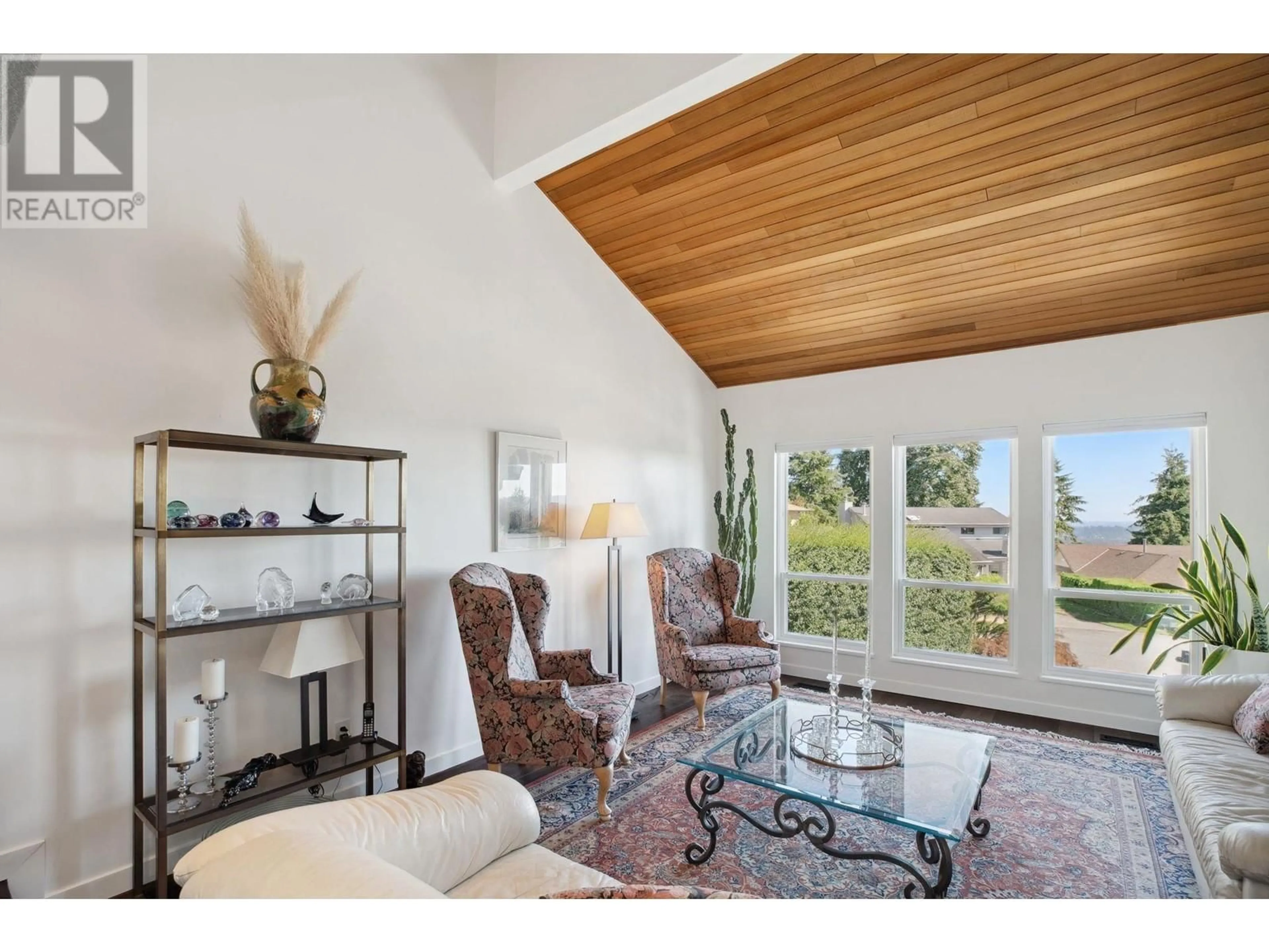 Living room with furniture, wood/laminate floor for 1613 HEMLOCK PLACE, Port Moody British Columbia V3H4A7