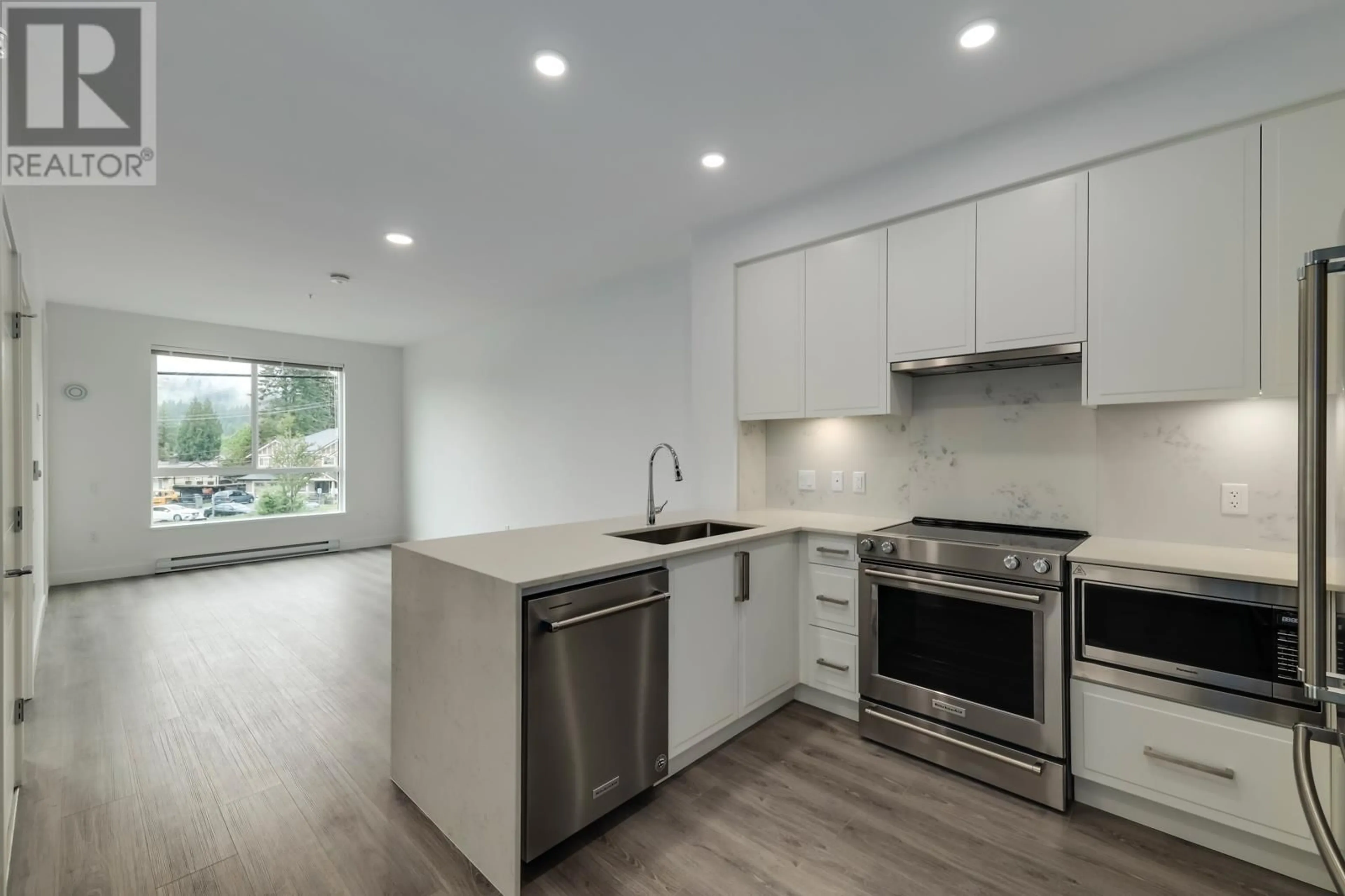 Open concept kitchen, unknown for 208 700 CLARKE ROAD, Coquitlam British Columbia V3J0K5